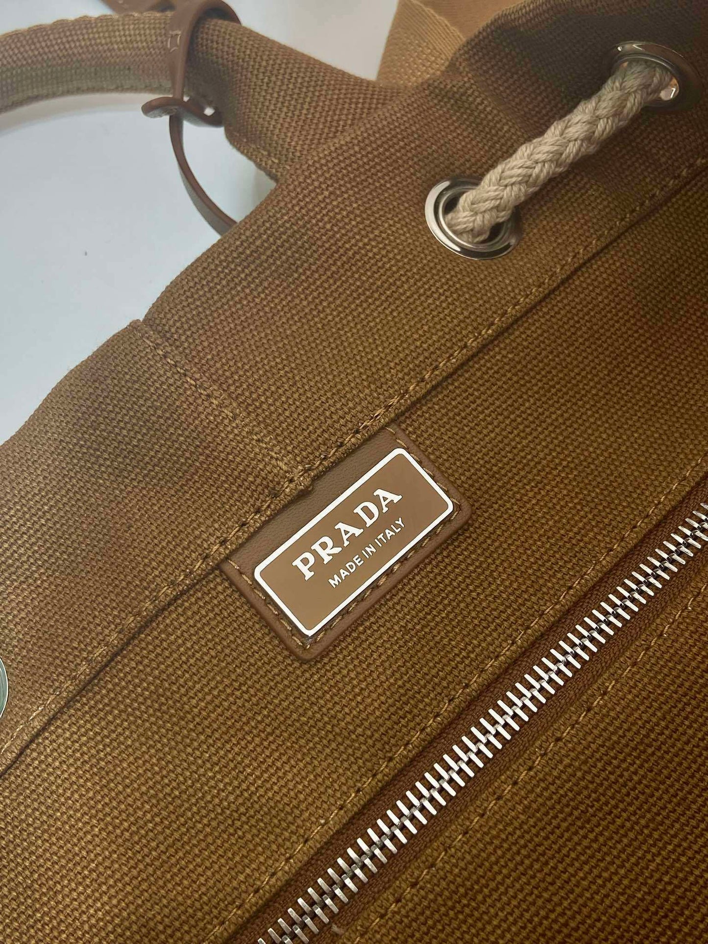 Prada canvas drawstring duffle bag
