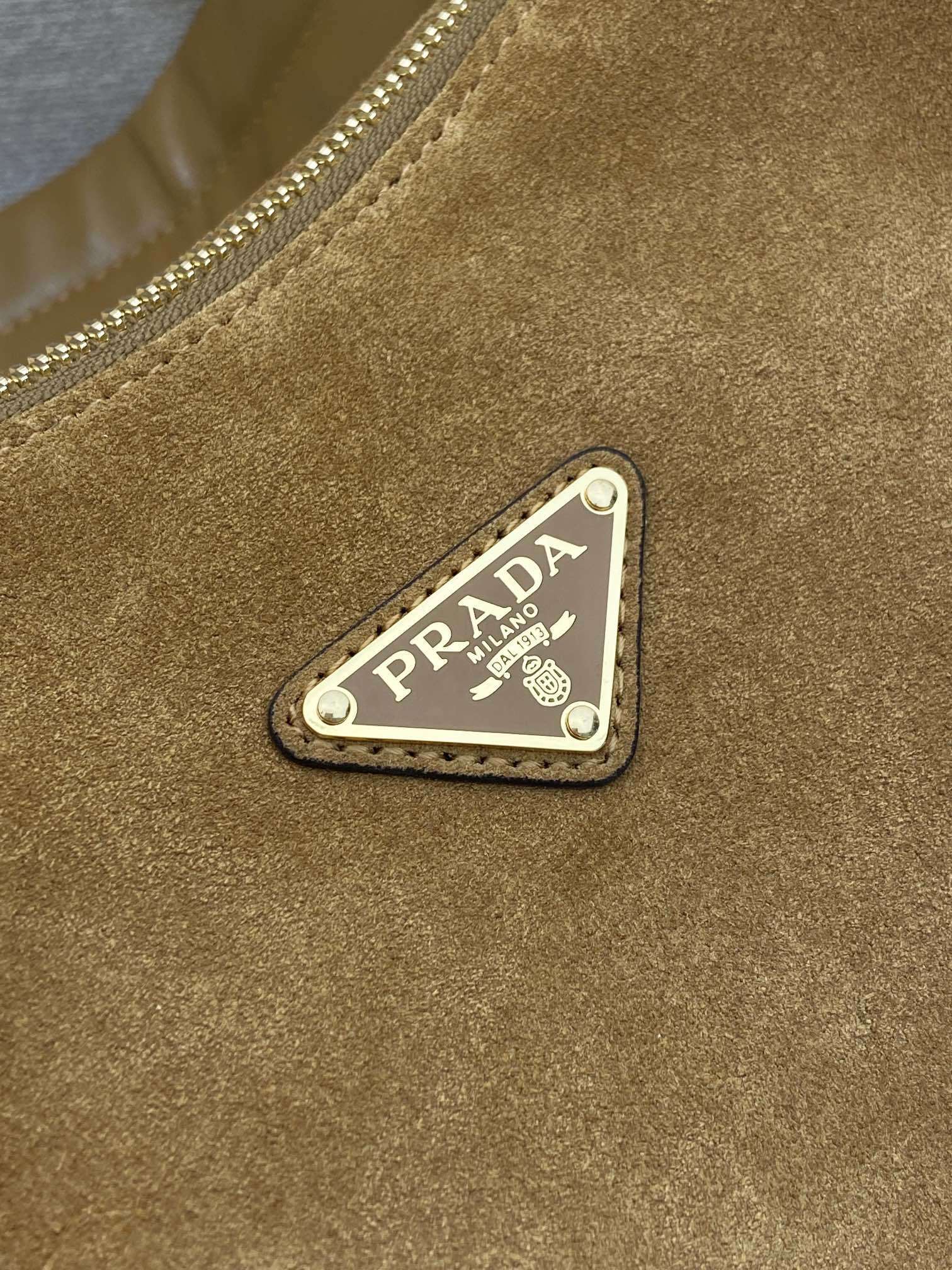 Prada Explore large suede bag