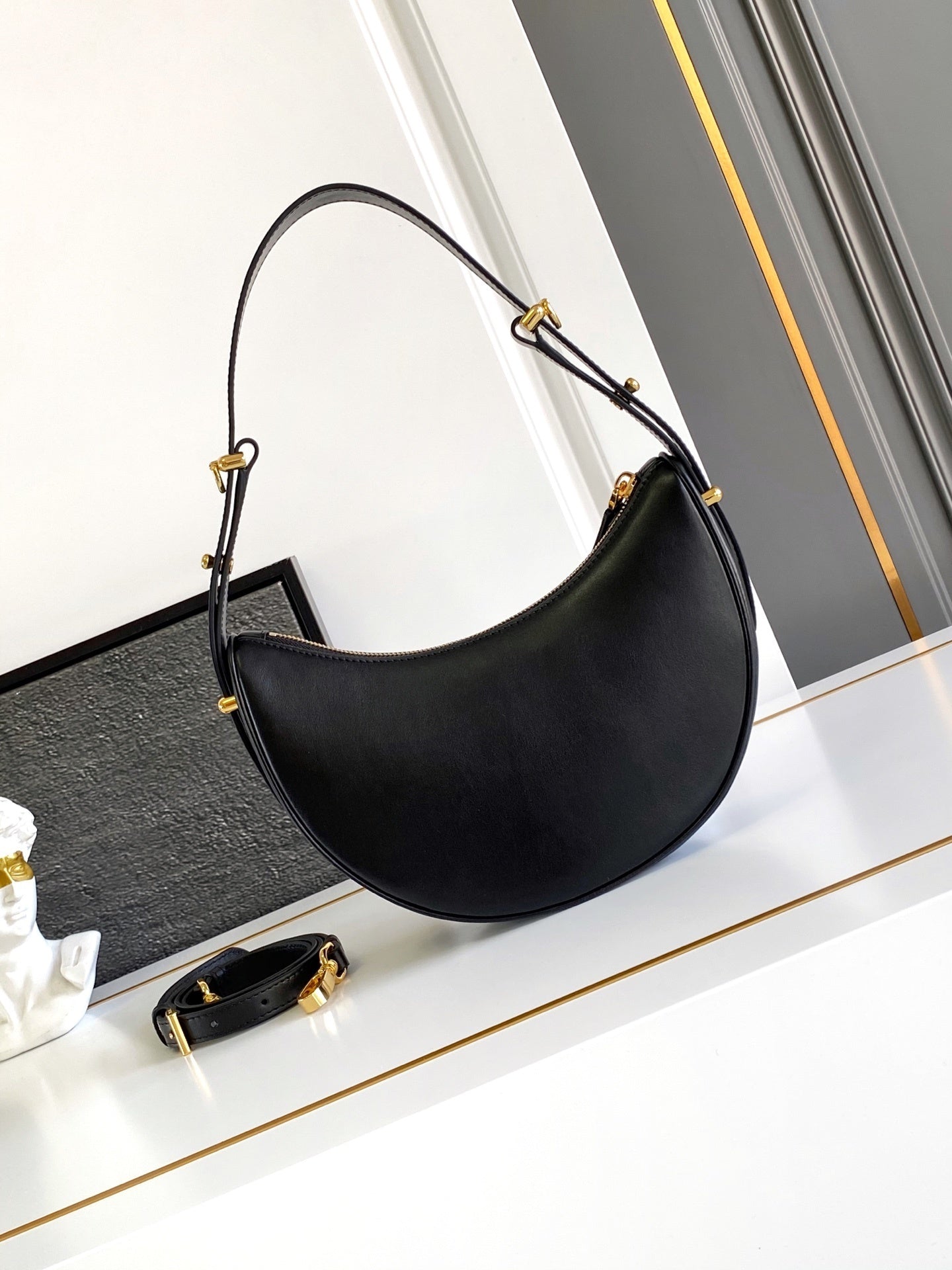 Prada Arqué small leather shoulder bag