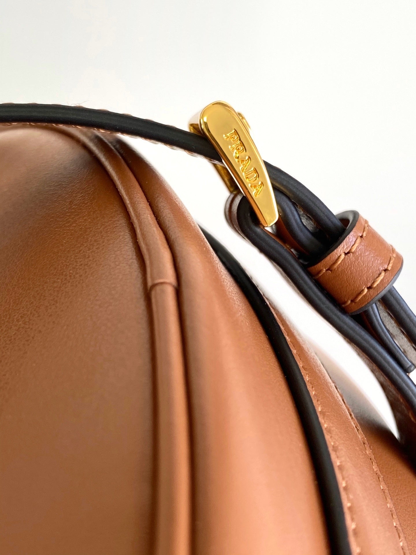 Prada Arqué small leather shoulder bag