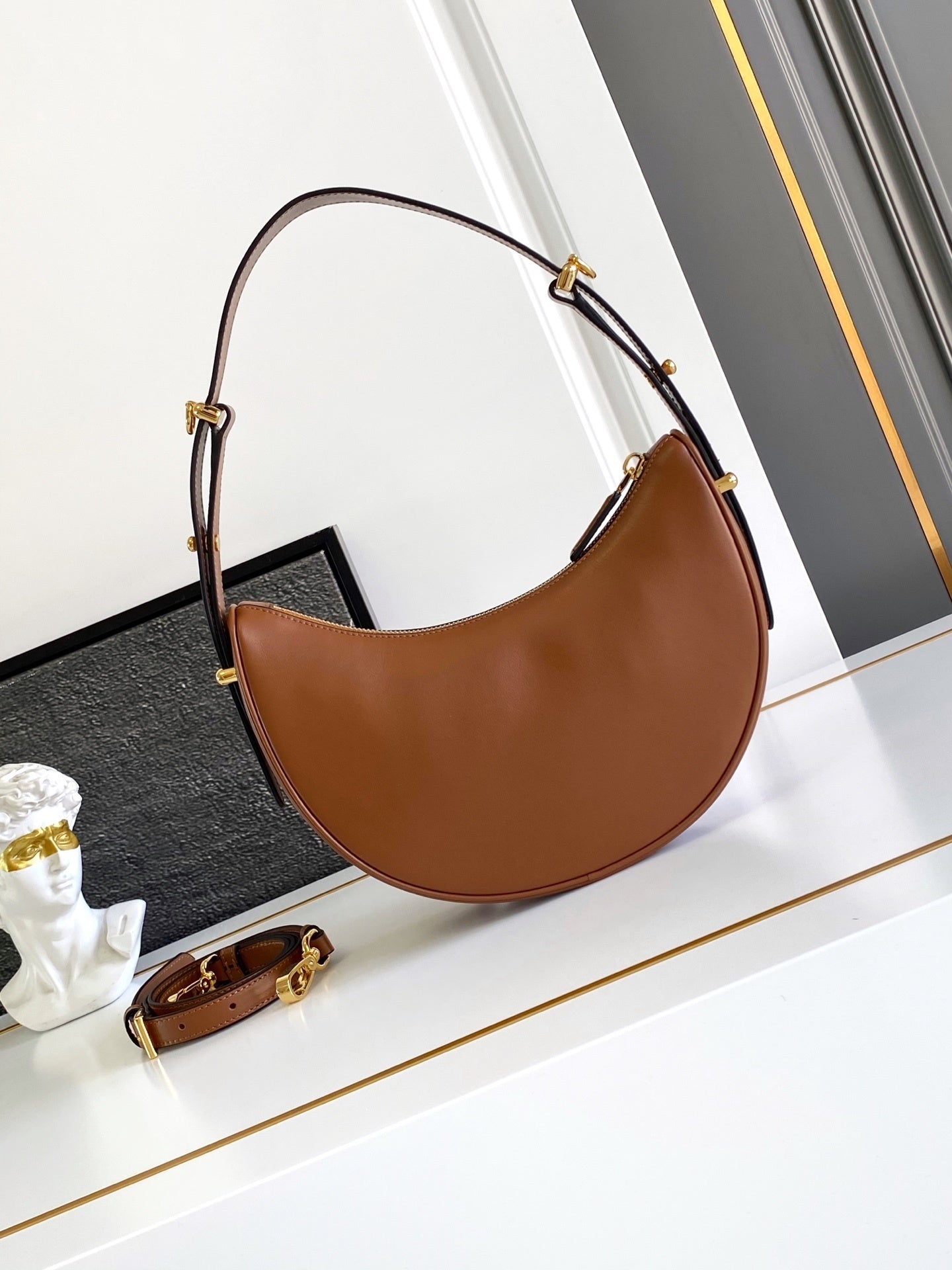 Prada Arqué small leather shoulder bag