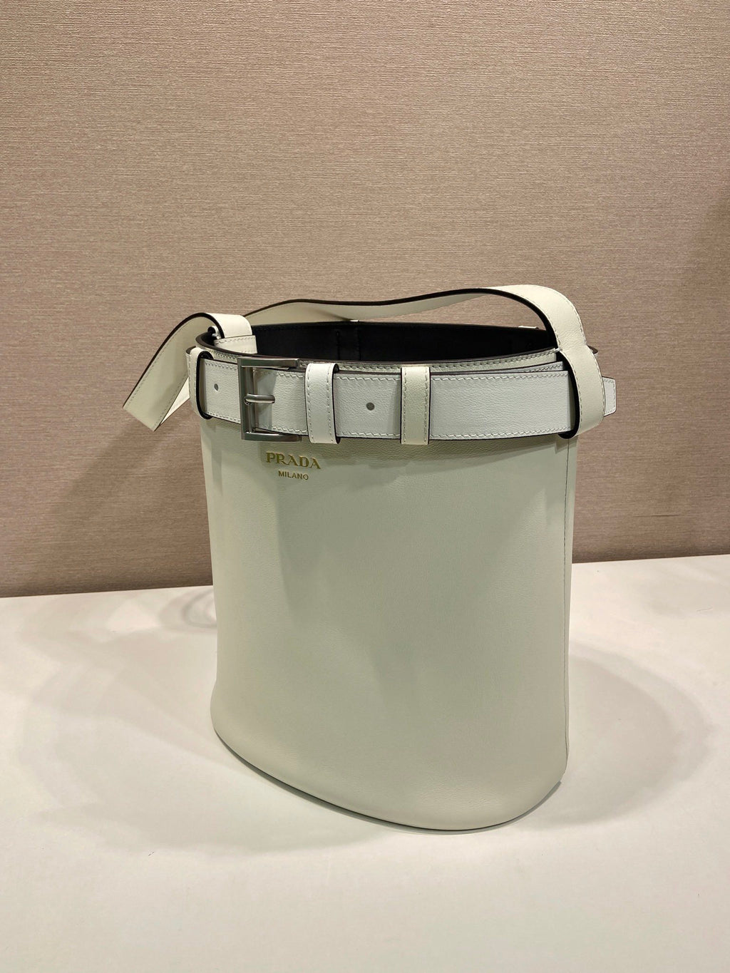 Prada Buckle leather bucket bag with belt