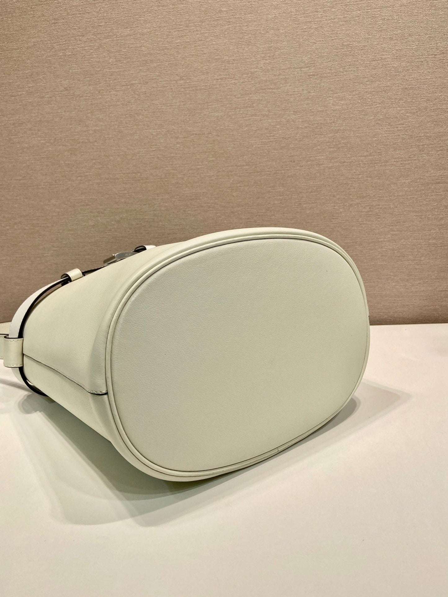 Prada Buckle leather bucket bag with belt