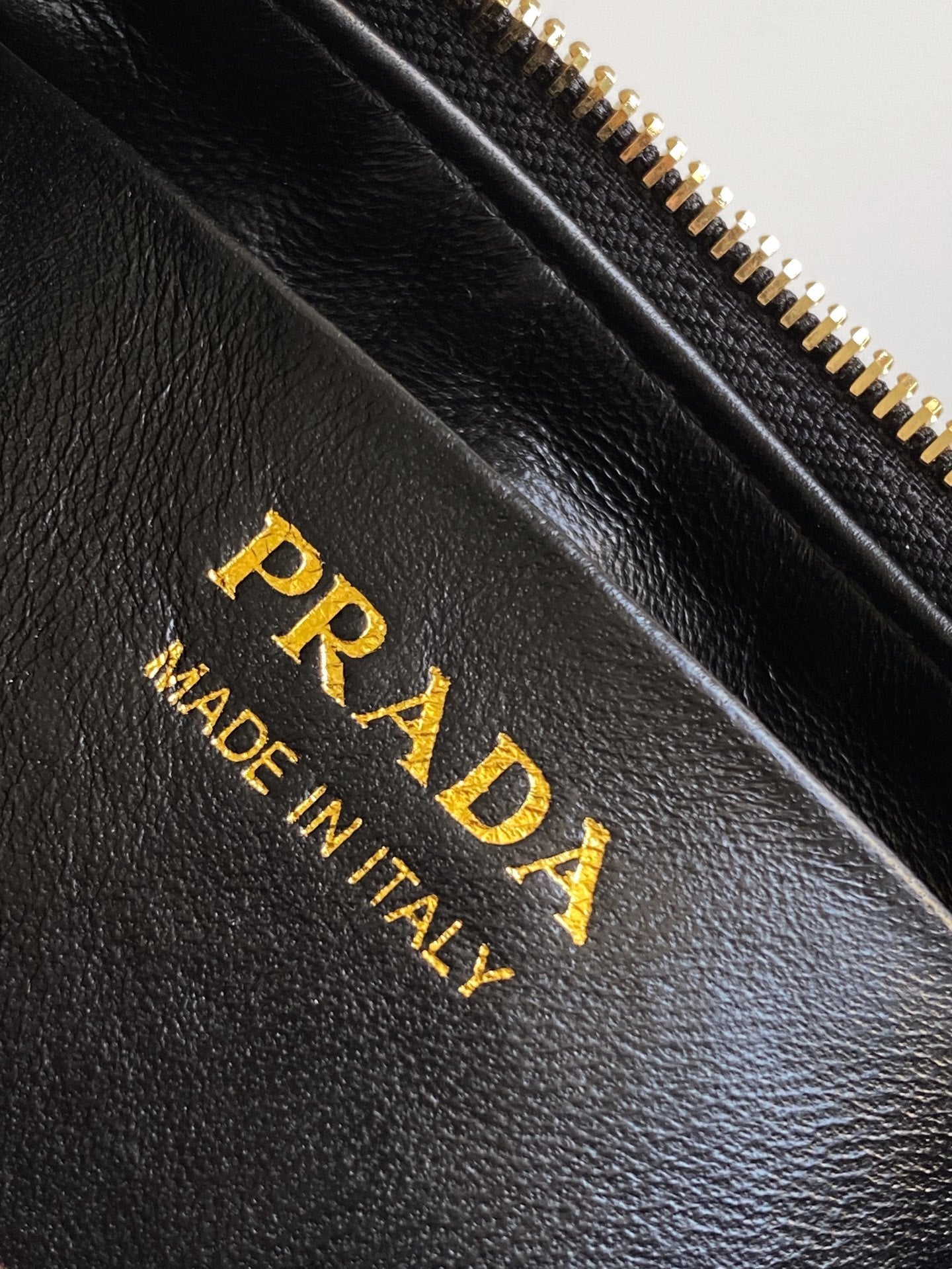 Prada Arqué small leather shoulder bag