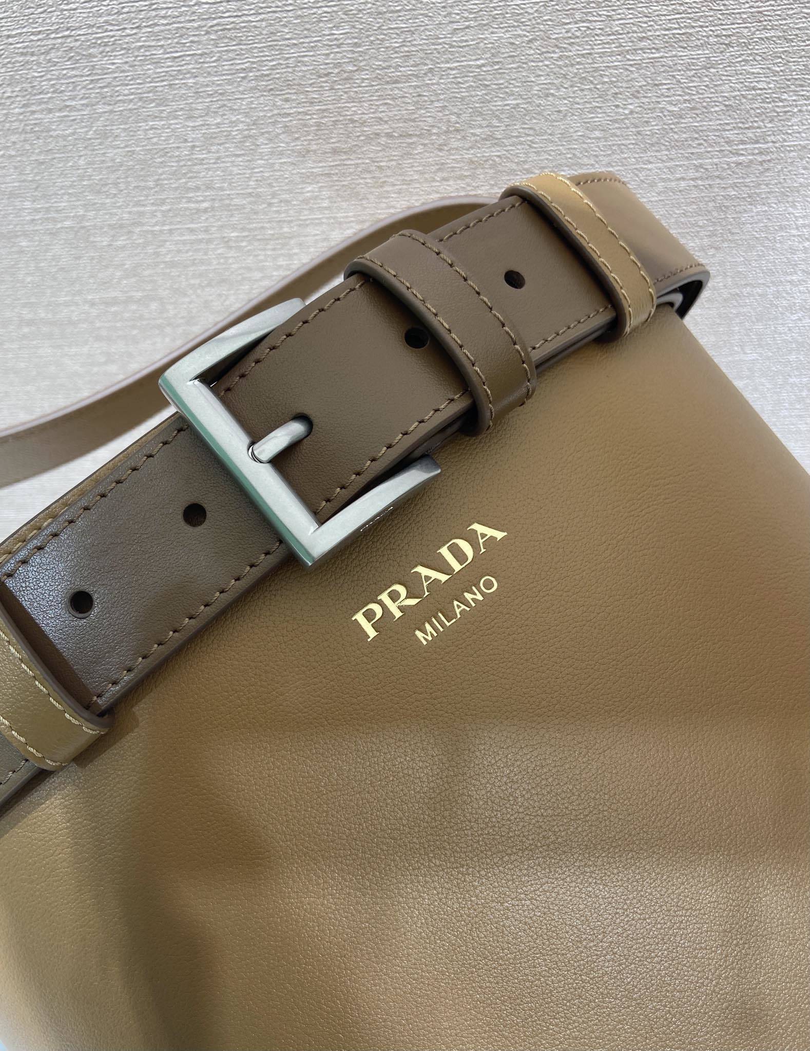 Prada Buckle leather bucket bag with belt