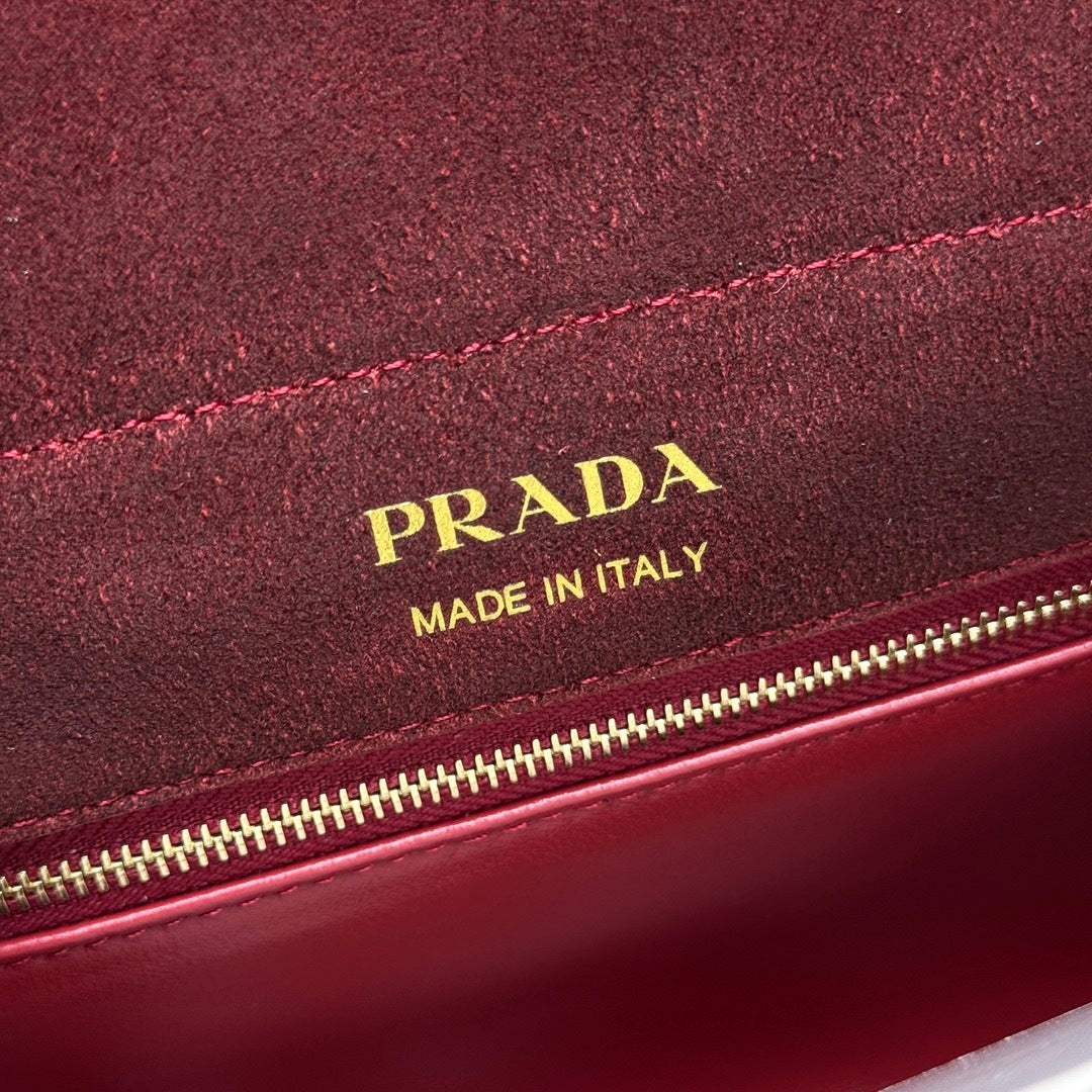 Prada Enchaine mini suede bag