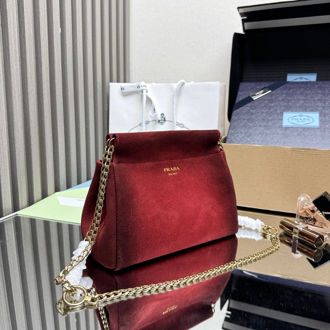 Prada Enchaine mini suede bag