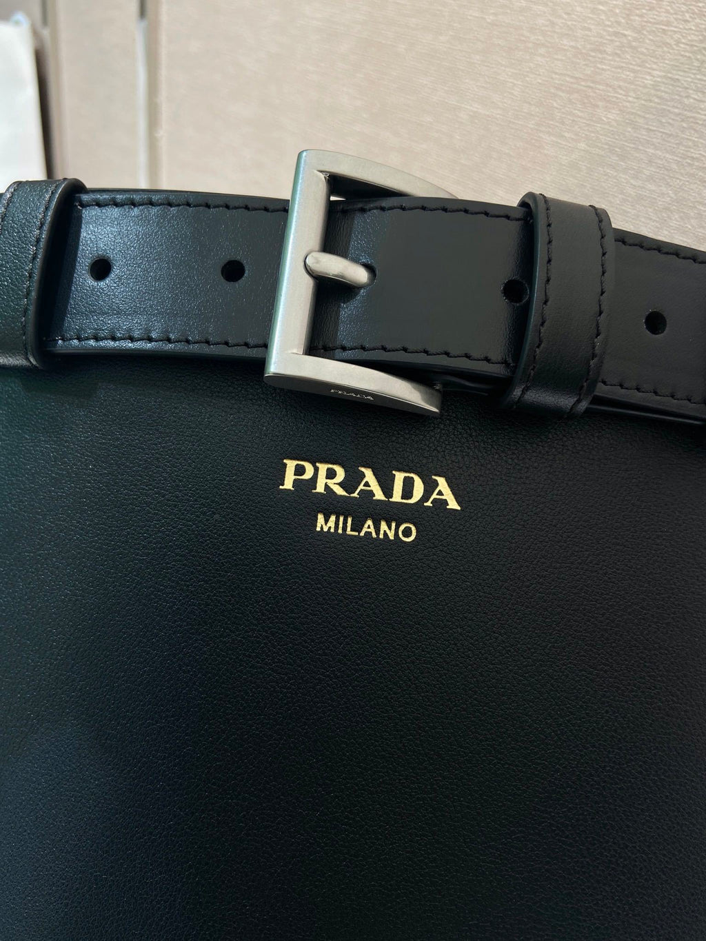 Prada Buckle leather bucket bag with belt