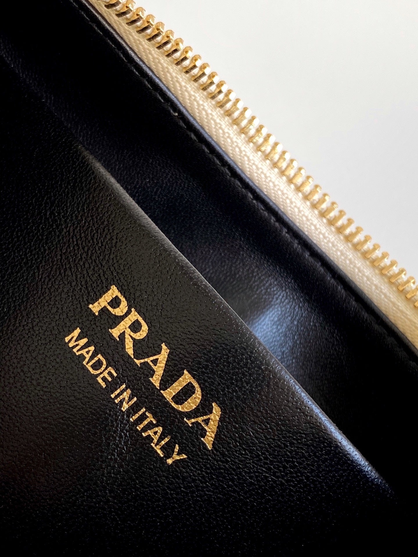 Prada Arqué small leather shoulder bag