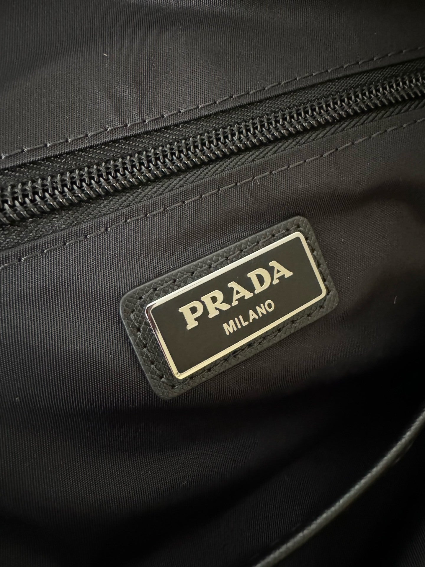 Re-Nylon and Saffiano leather backpack