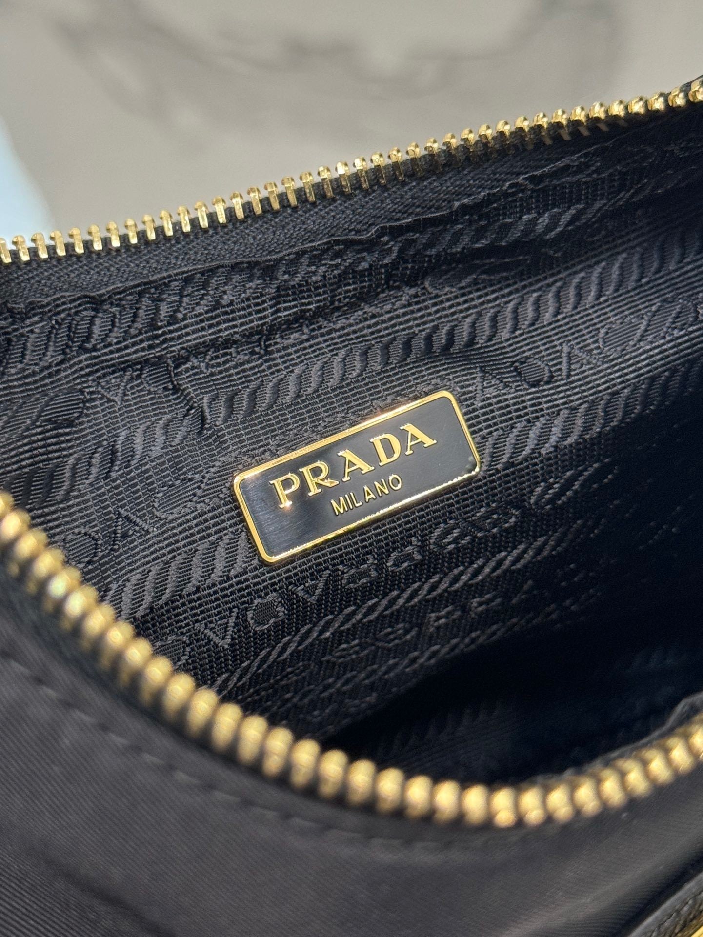 Prada Re-Edition 2005 Saffiano leather mini-bag