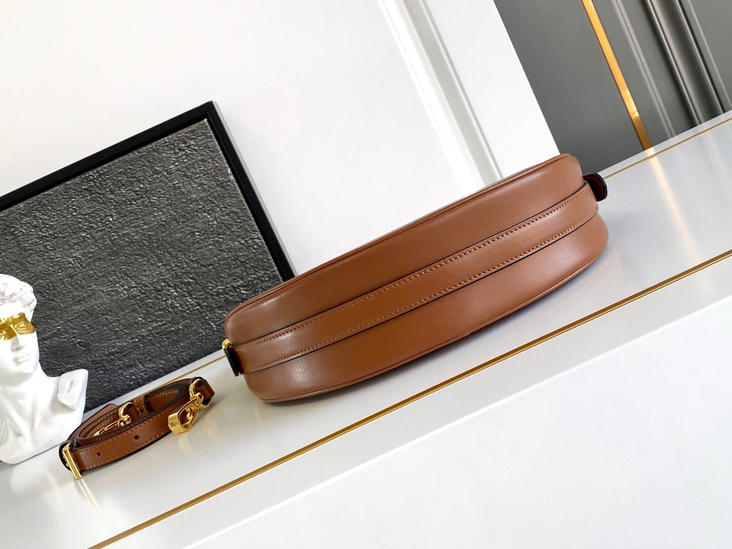 Prada Arqué small leather shoulder bag