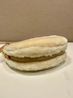 Prada Arqué shearling and leather shoulder bag