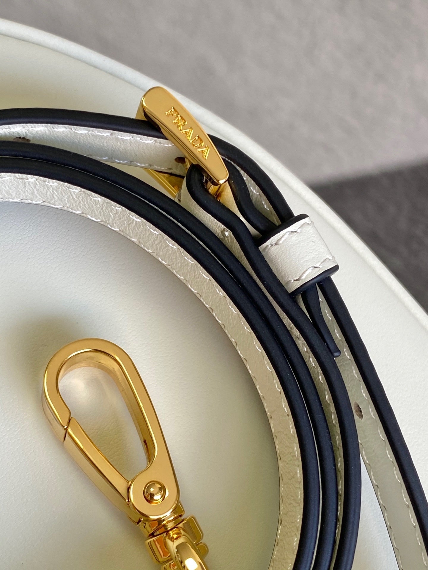 Prada Arqué small leather shoulder bag