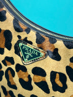 Prada Arque printed leather mini shoulder bag