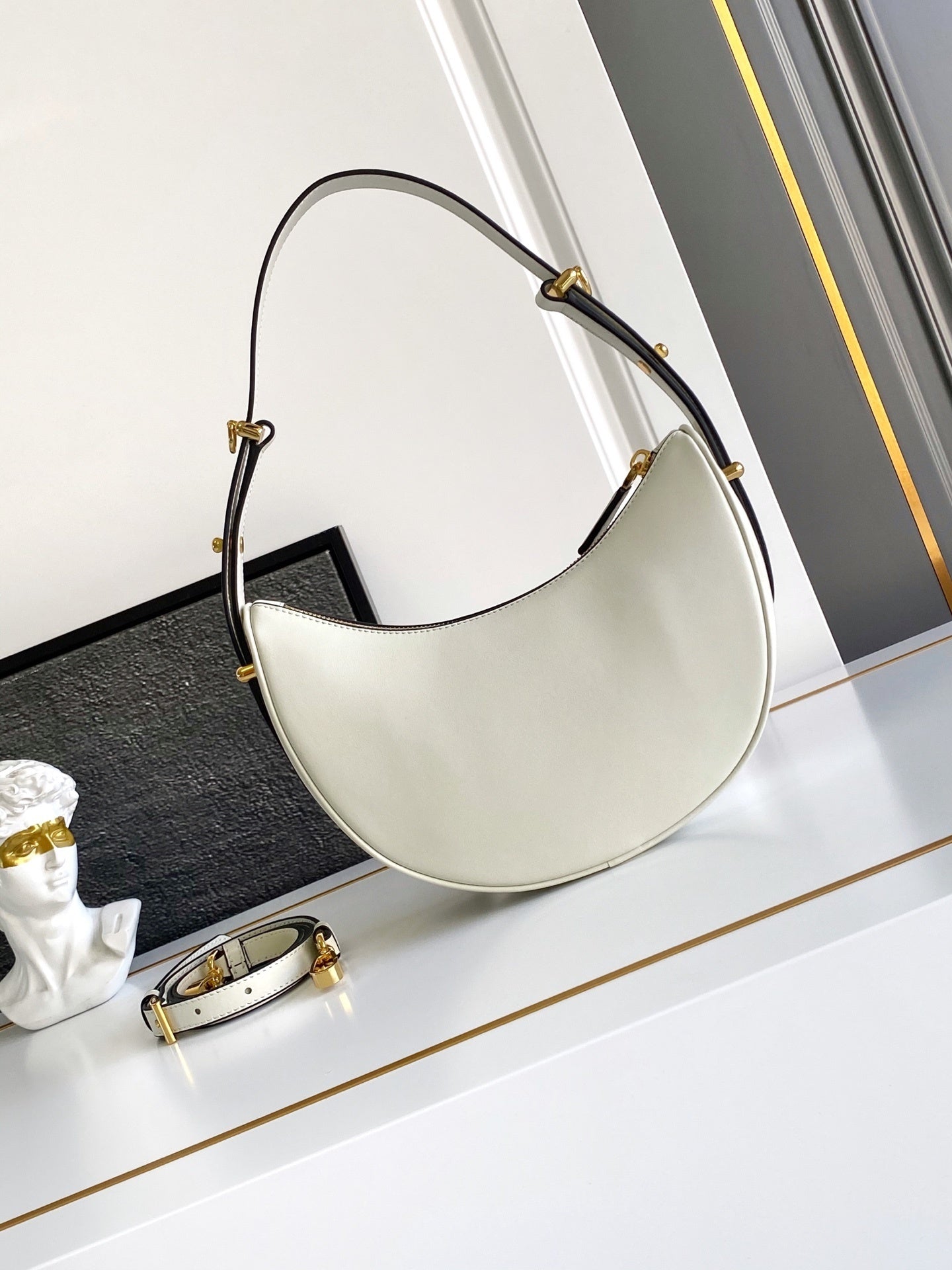 Prada Arqué small leather shoulder bag