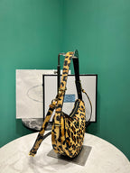 Prada Arque printed leather mini shoulder bag