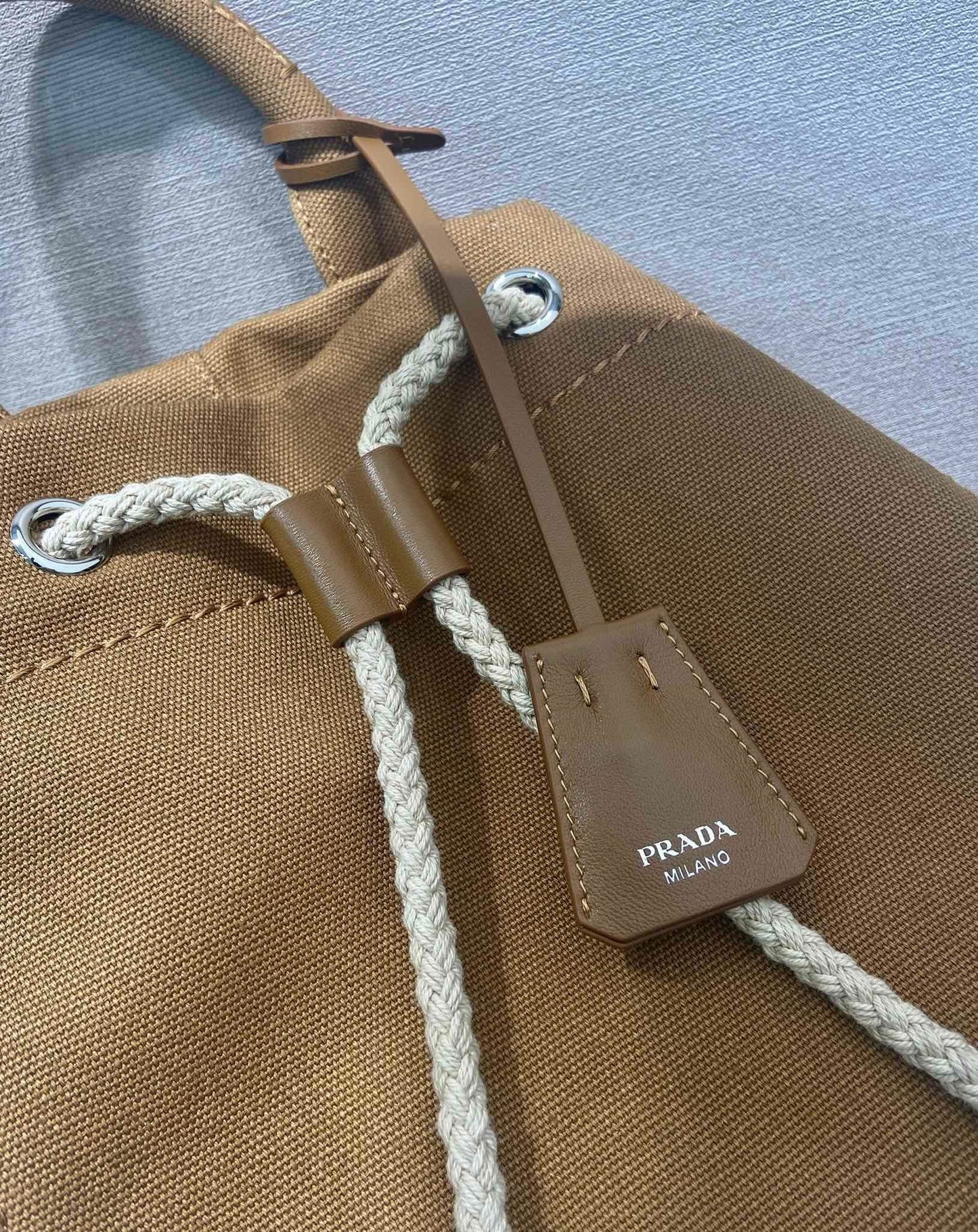 Prada canvas drawstring duffle bag