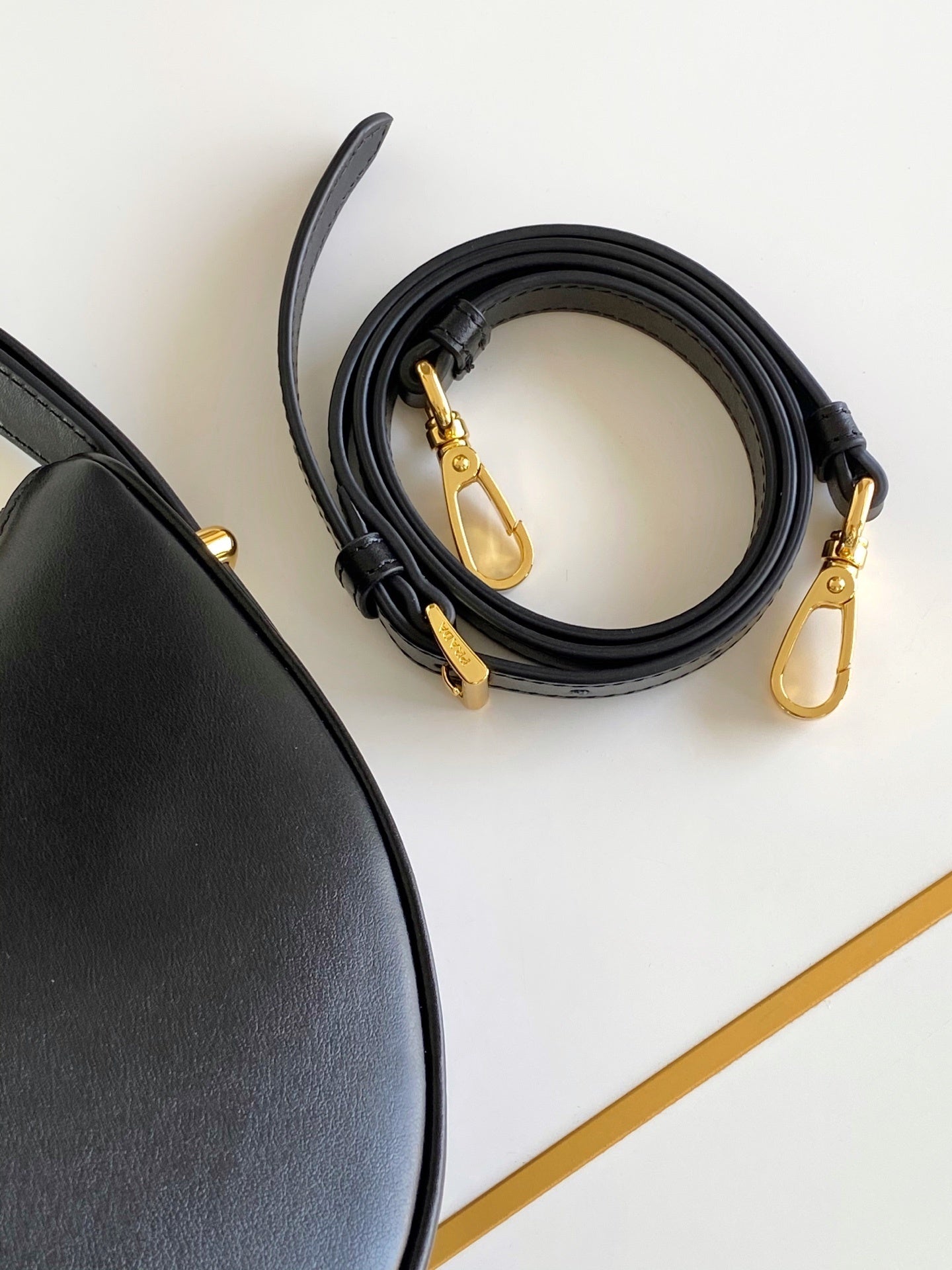 Prada Arqué small leather shoulder bag