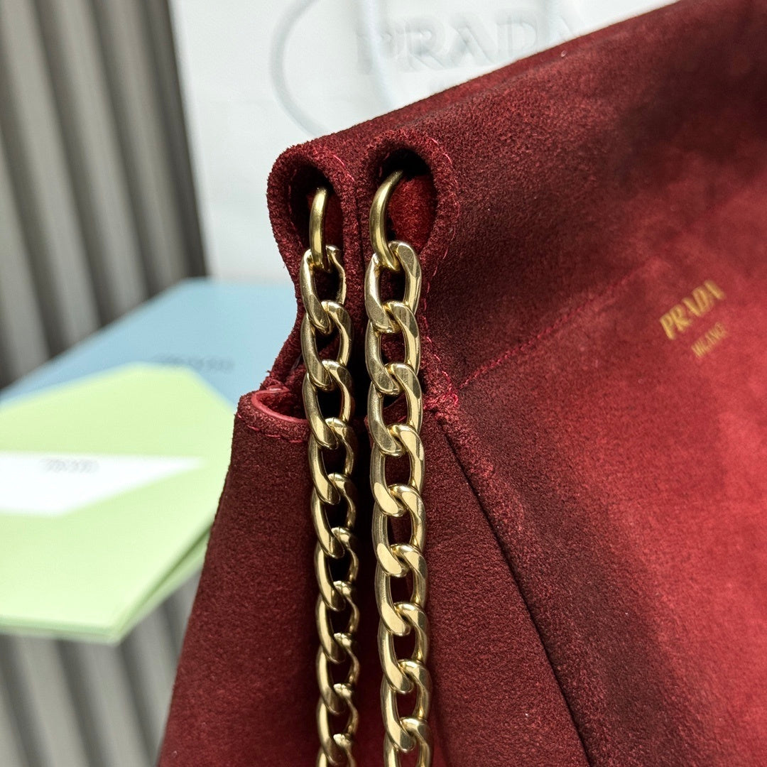Prada Enchaine mini suede bag