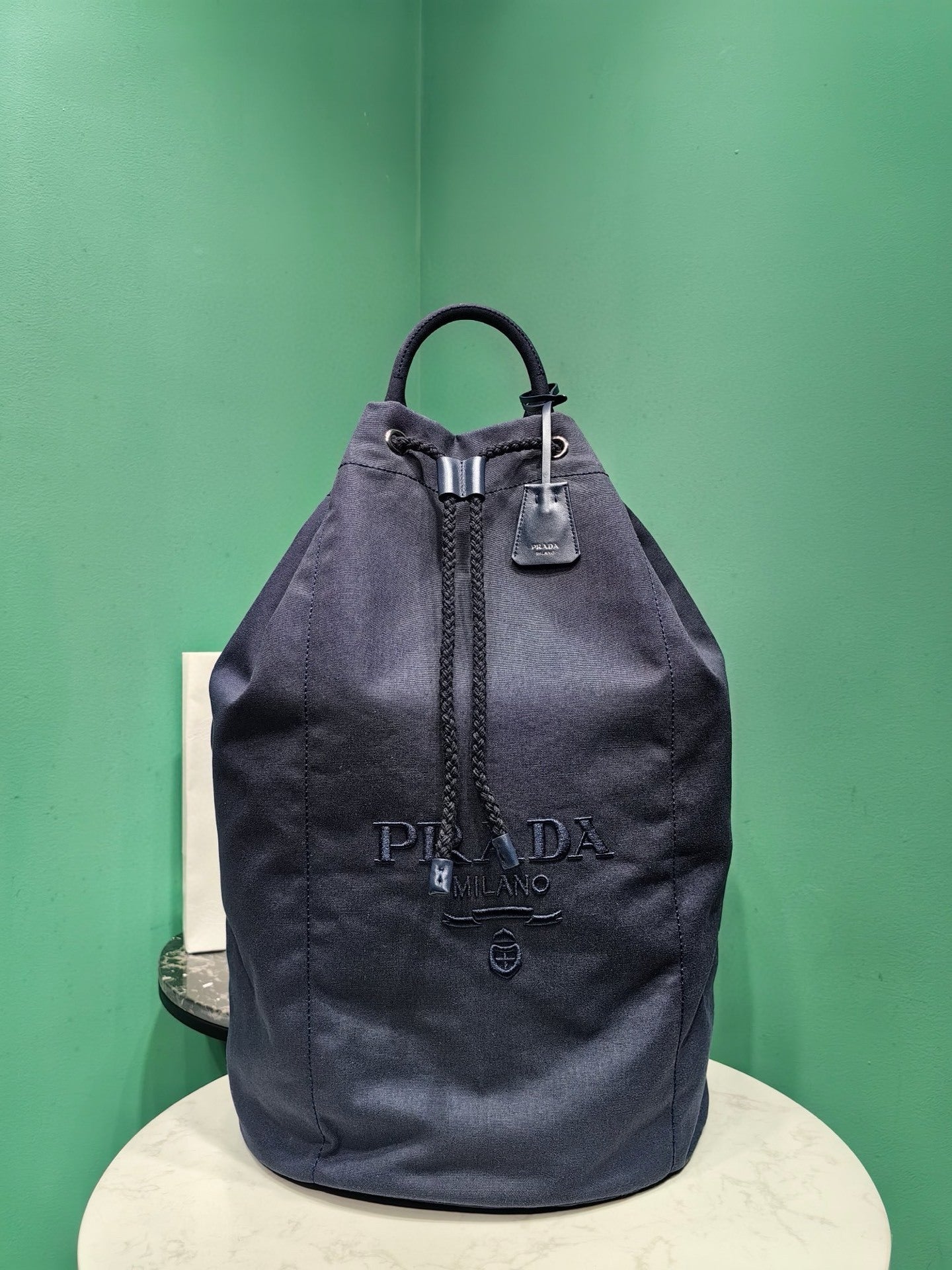 Prada canvas drawstring duffle bag