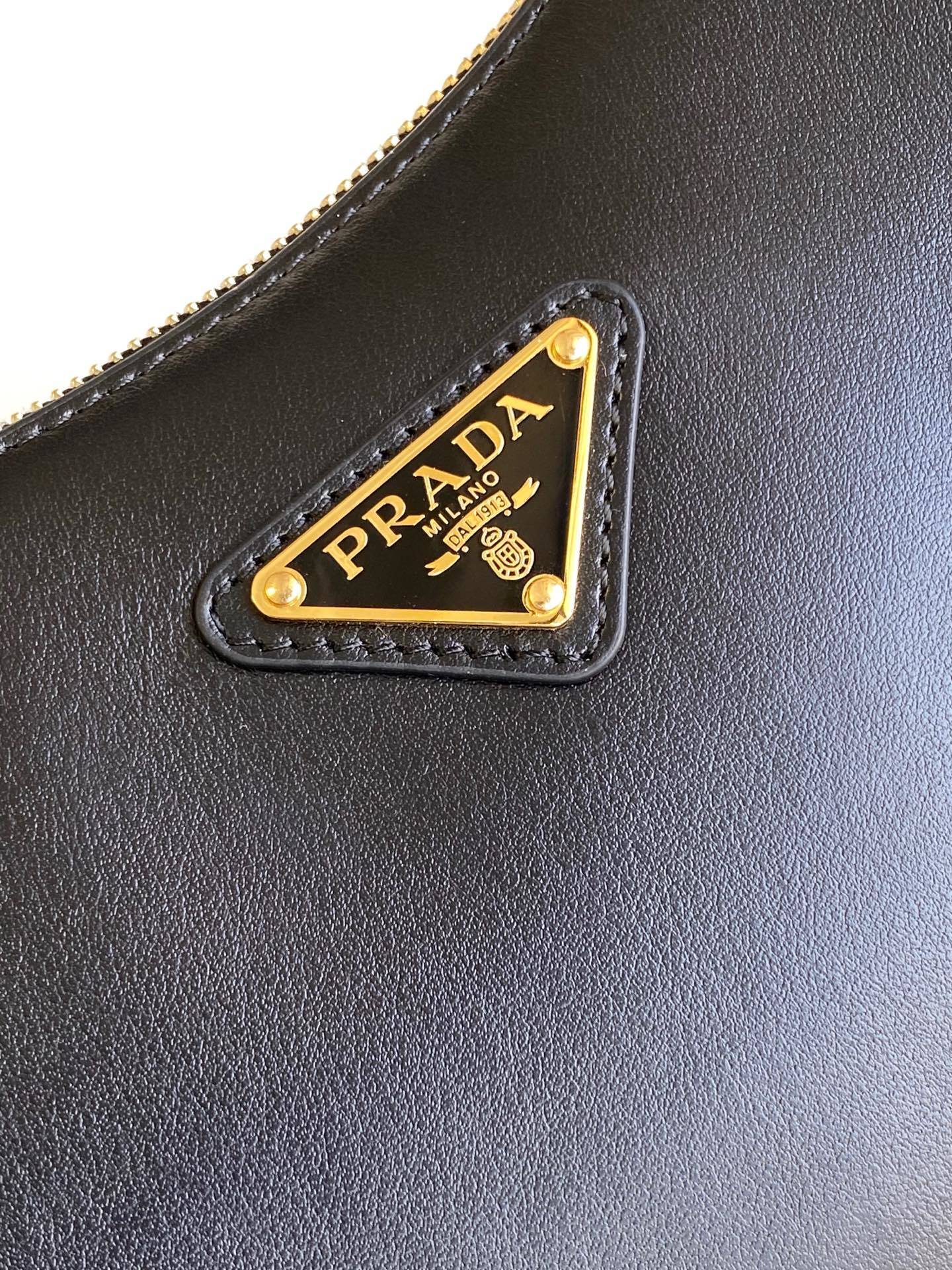 Prada Arqué small leather shoulder bag