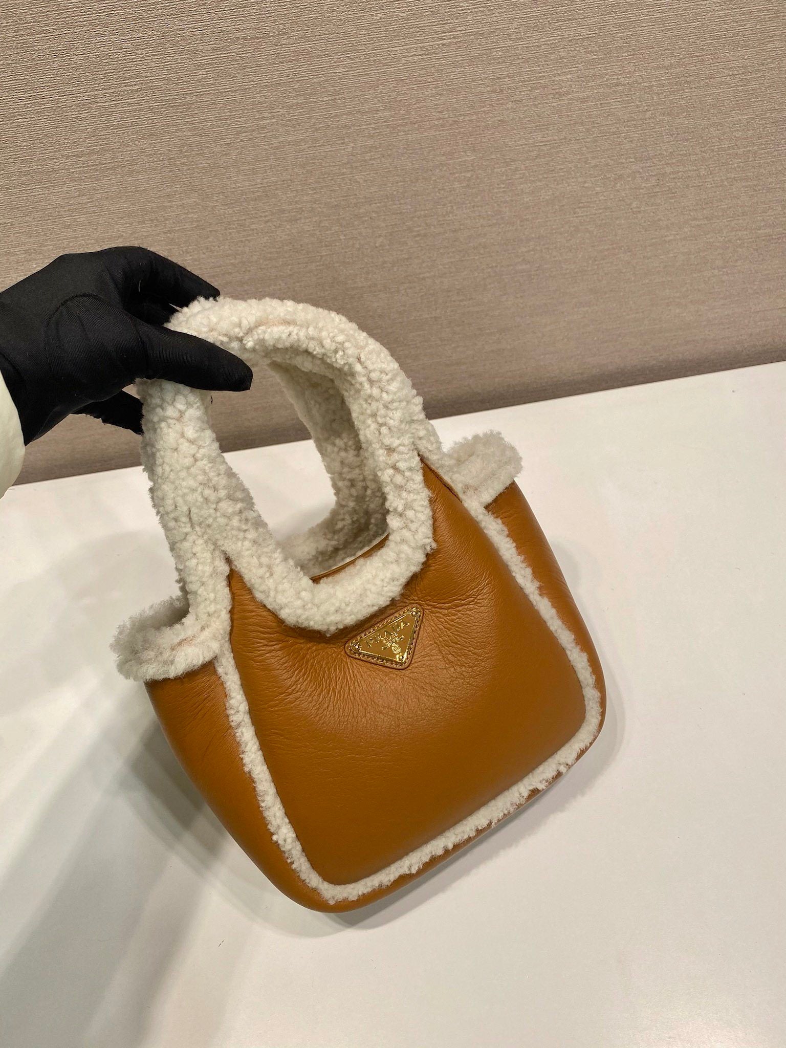 Prada mini shearling handbag