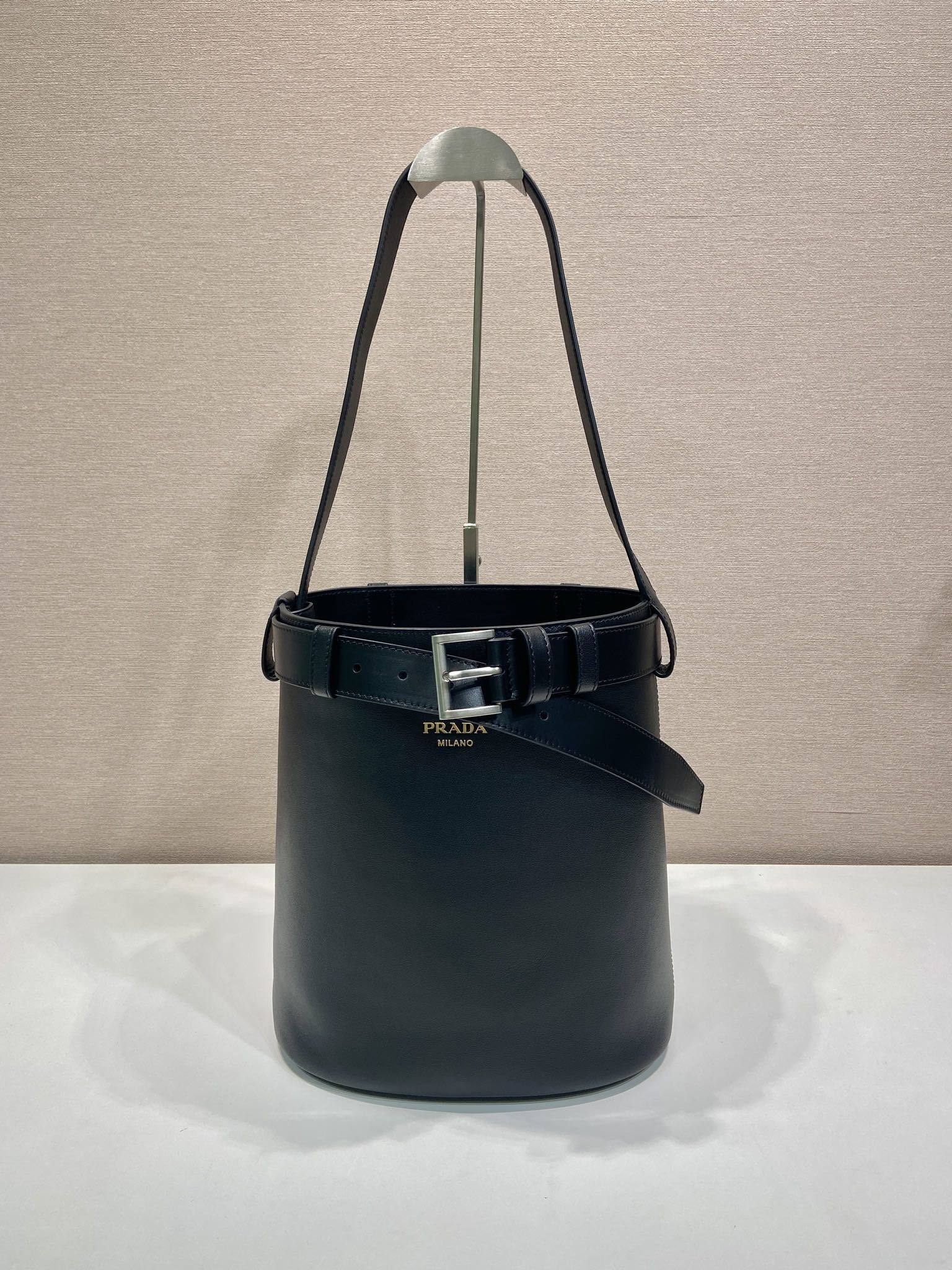 Prada Buckle leather bucket bag with belt