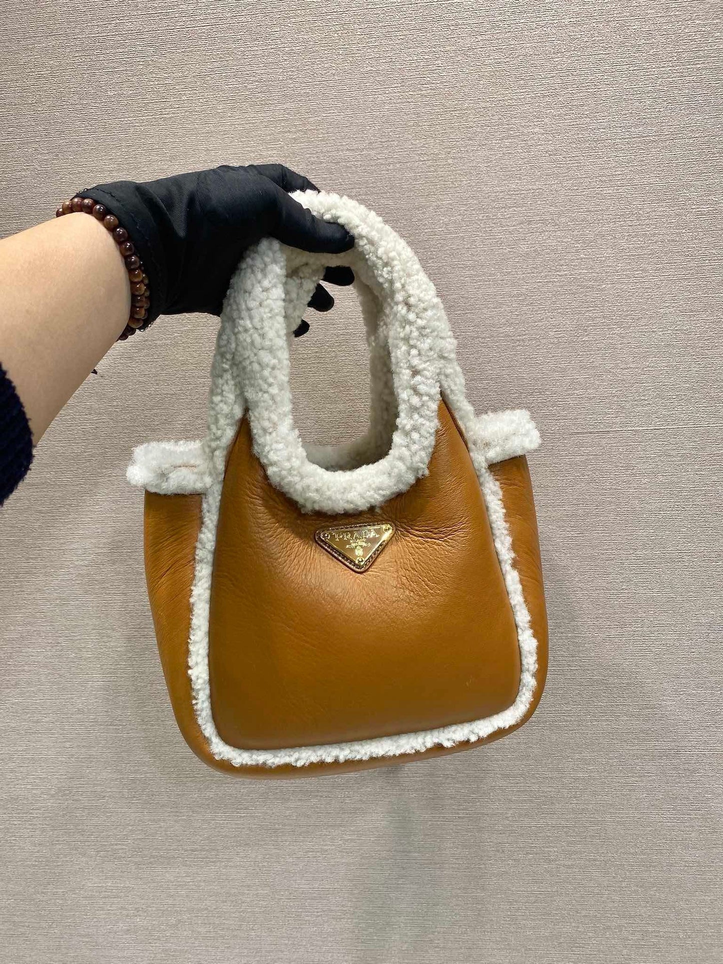 Prada mini shearling handbag