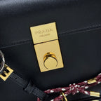 Prada Soft Sound small leather shoulder bag with charms