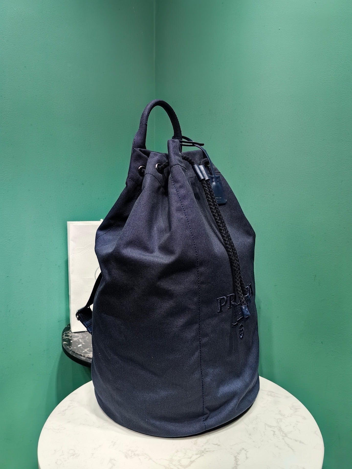 Prada canvas drawstring duffle bag