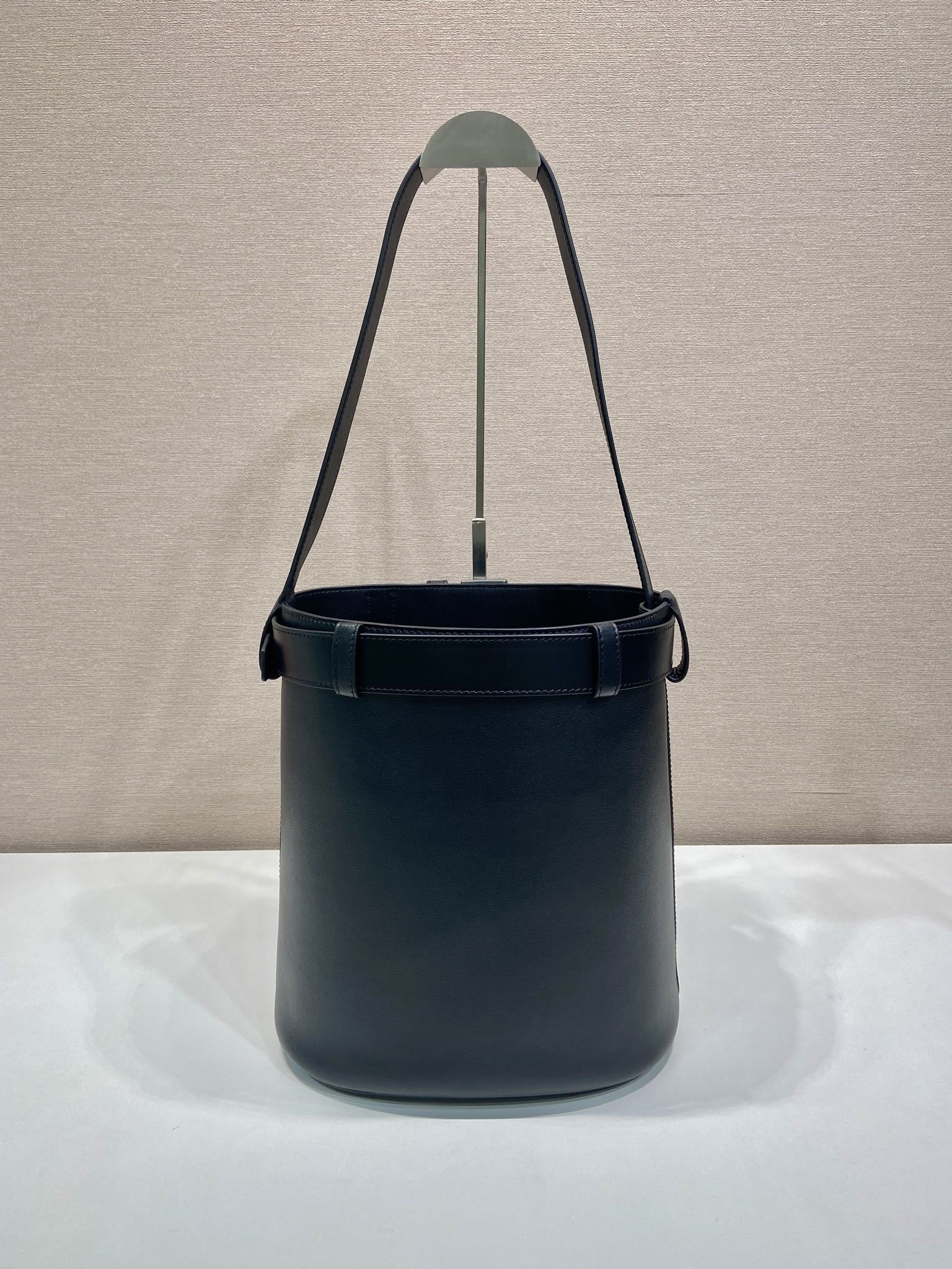 Prada Buckle leather bucket bag with belt