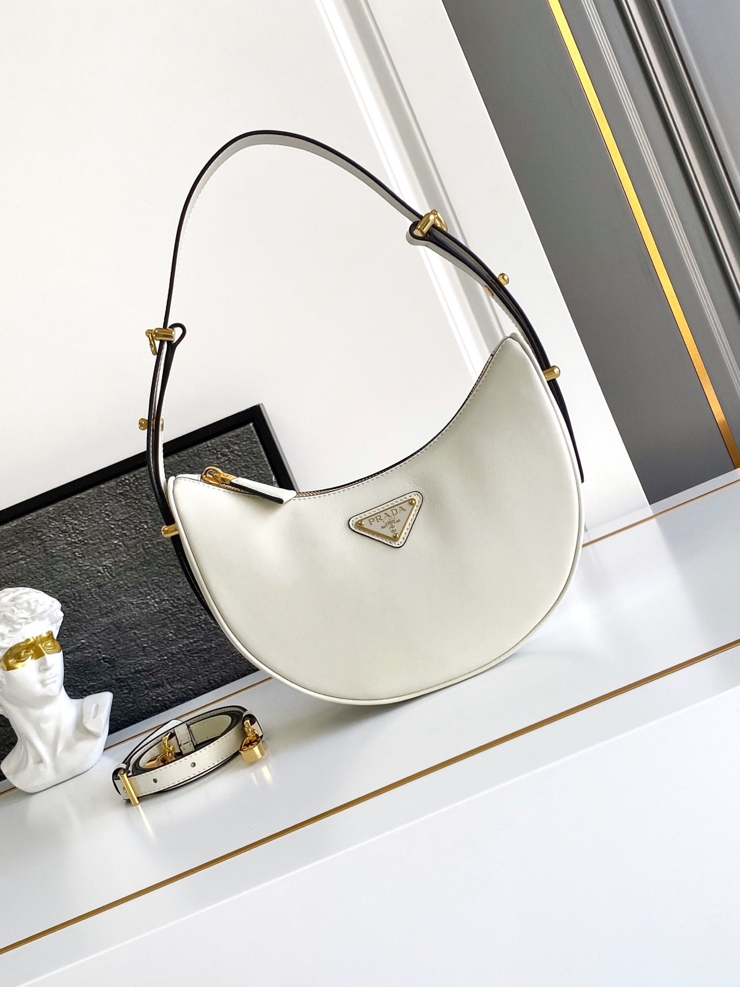 Prada Arqué small leather shoulder bag