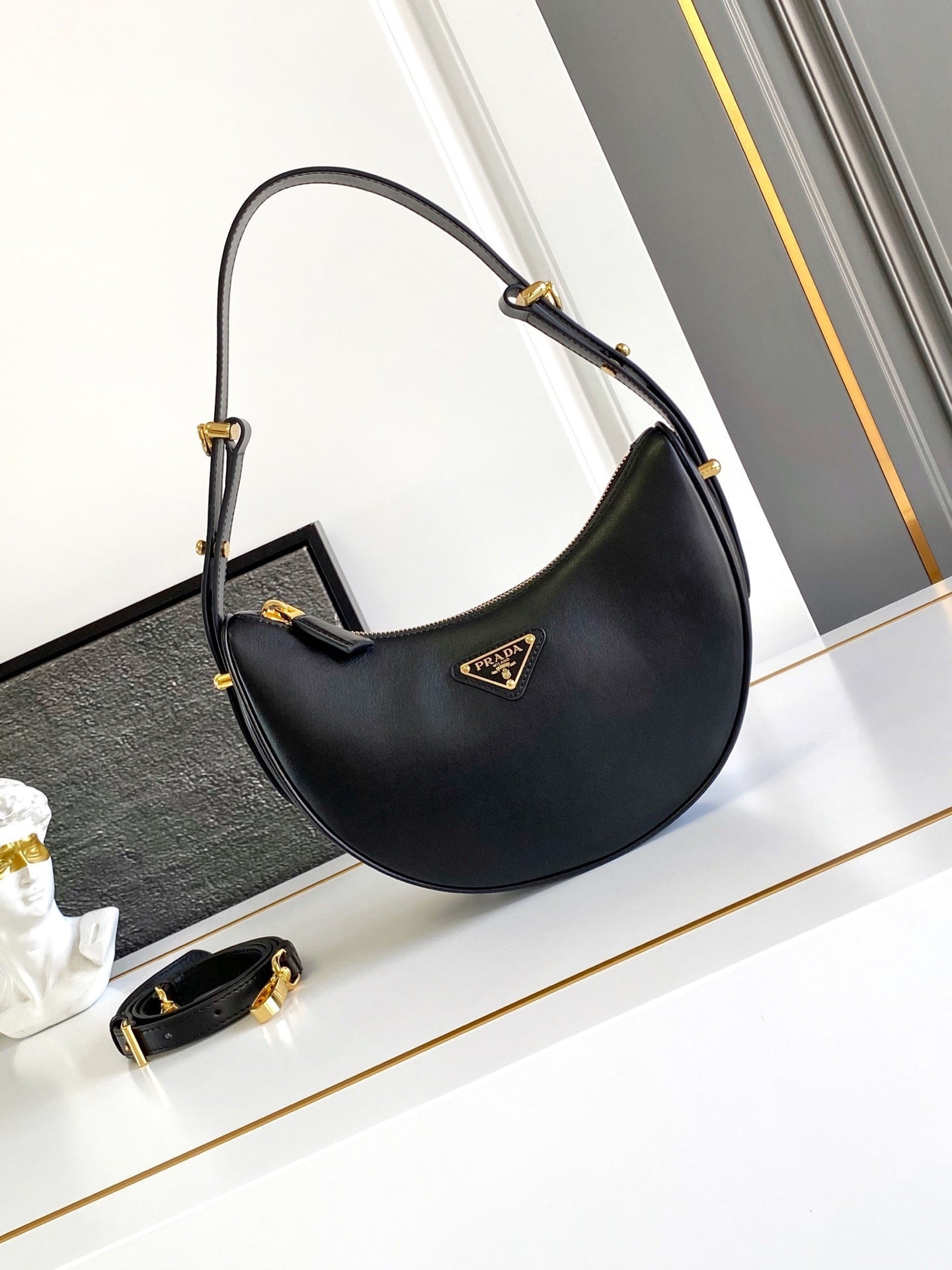 Prada Arqué small leather shoulder bag