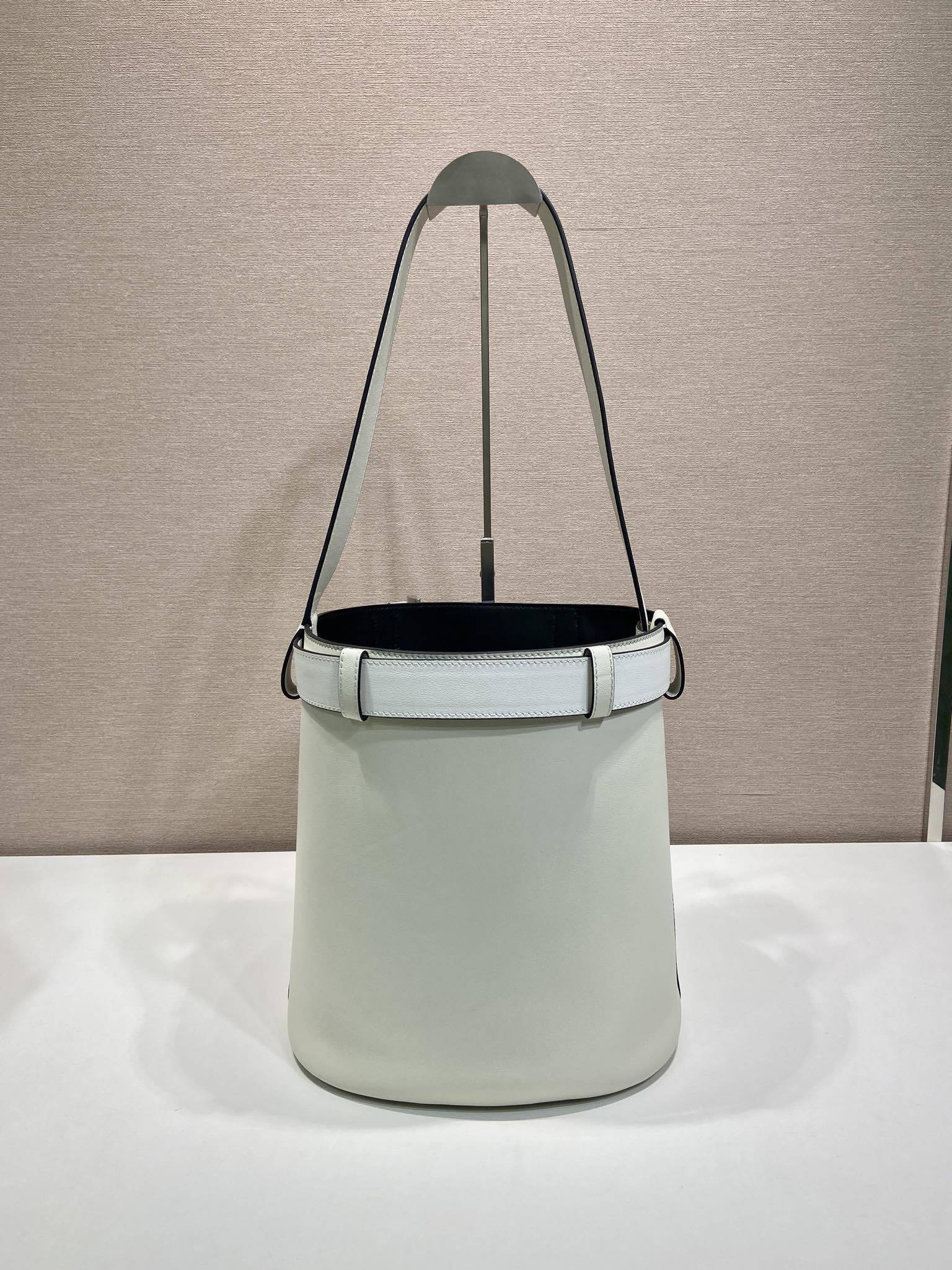 Prada Buckle leather bucket bag with belt