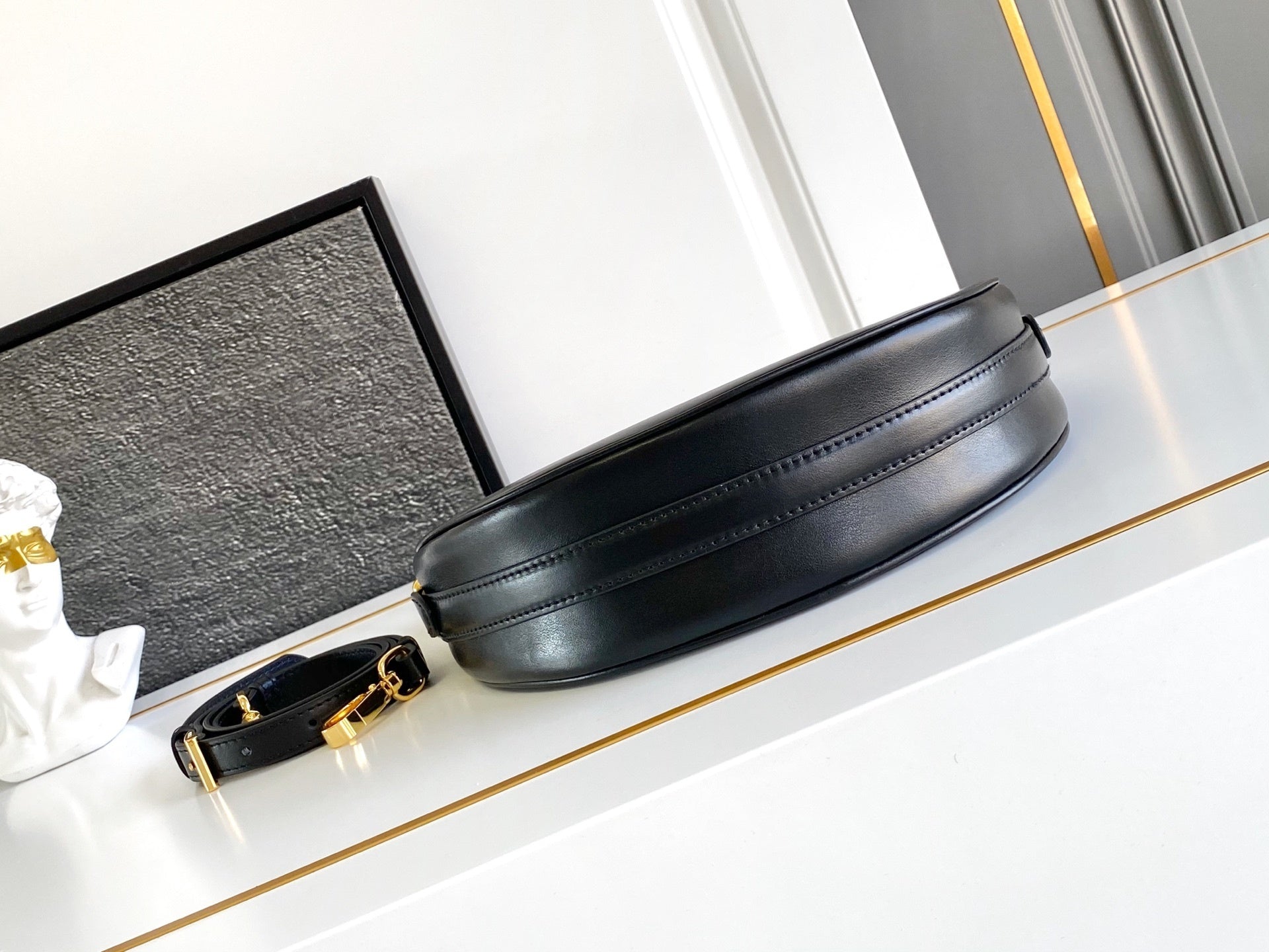 Prada Arqué small leather shoulder bag