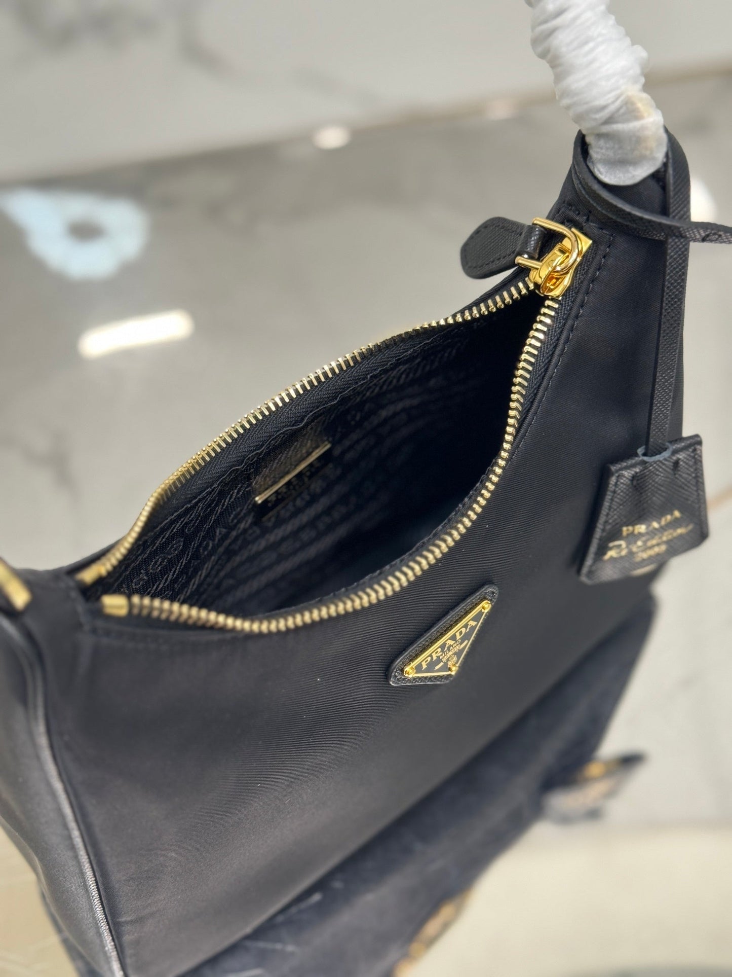 Prada Re-Edition 2005 Saffiano leather mini-bag