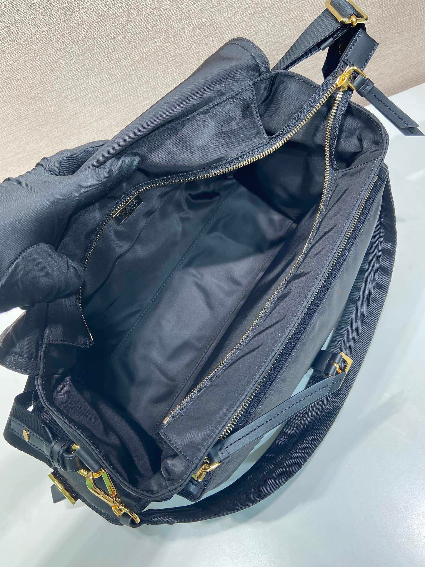 Prada Explore large Re-Nylon shoulder bag with flap