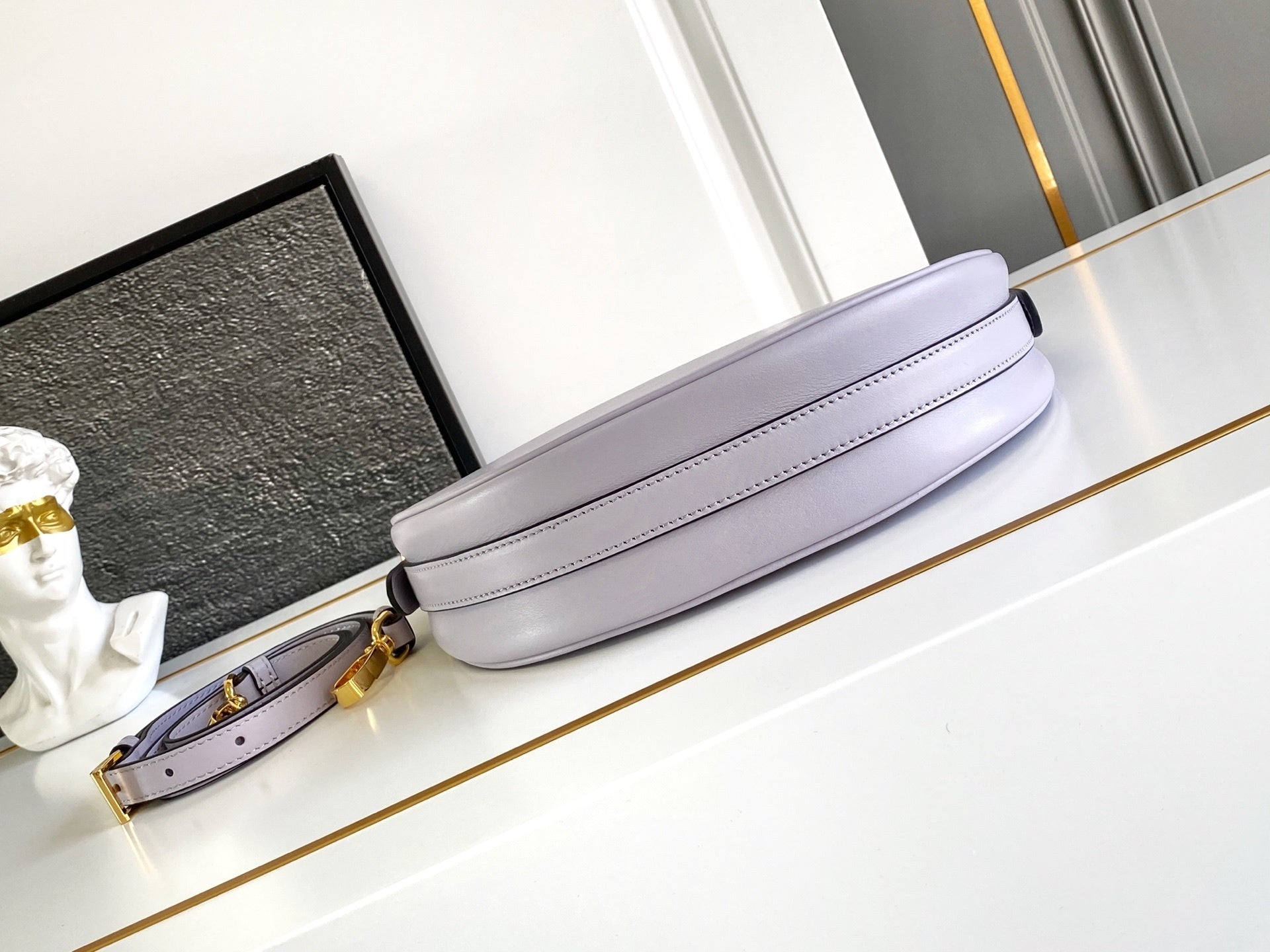 Prada Arqué small leather shoulder bag