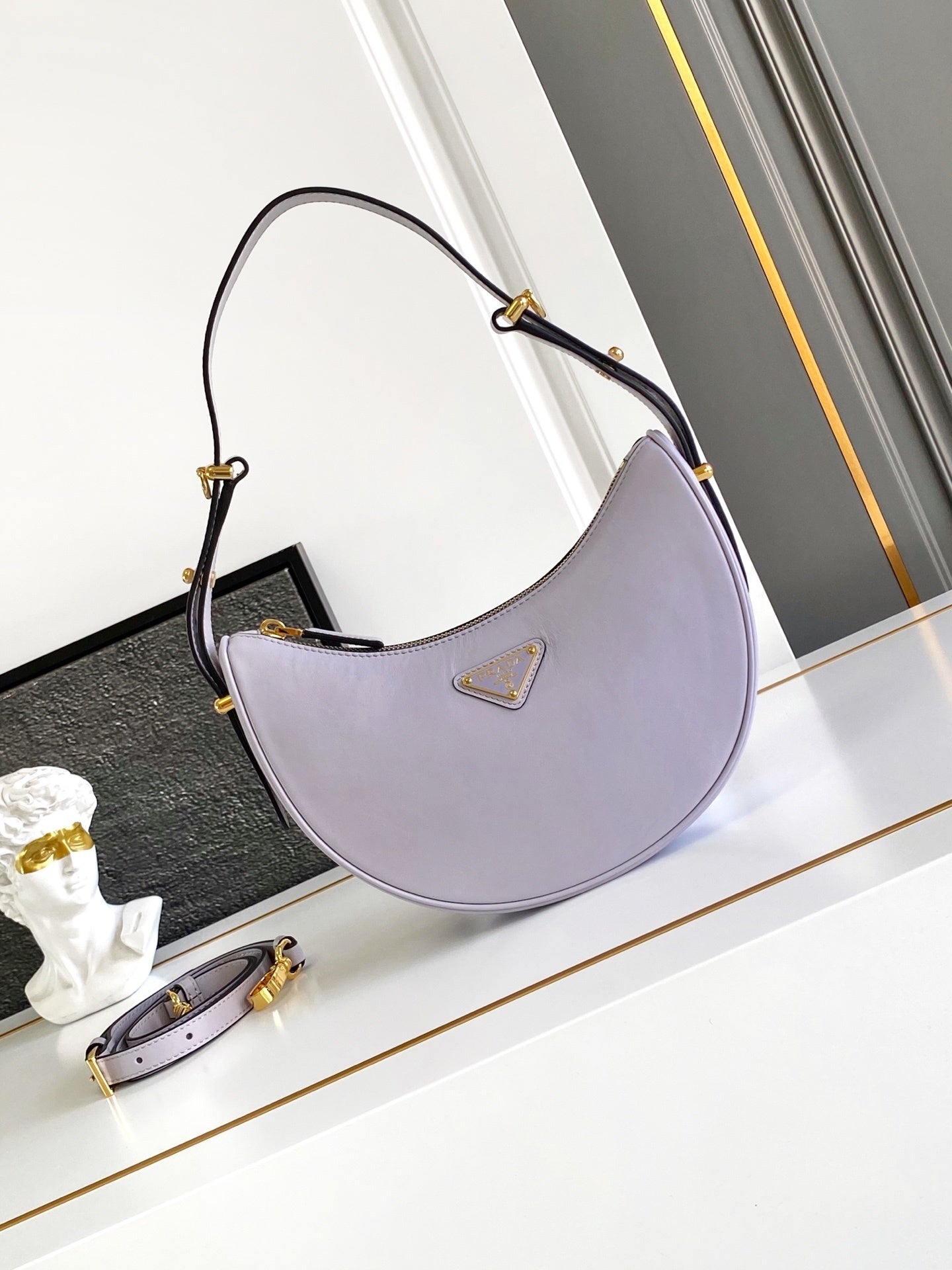 Prada Arqué small leather shoulder bag