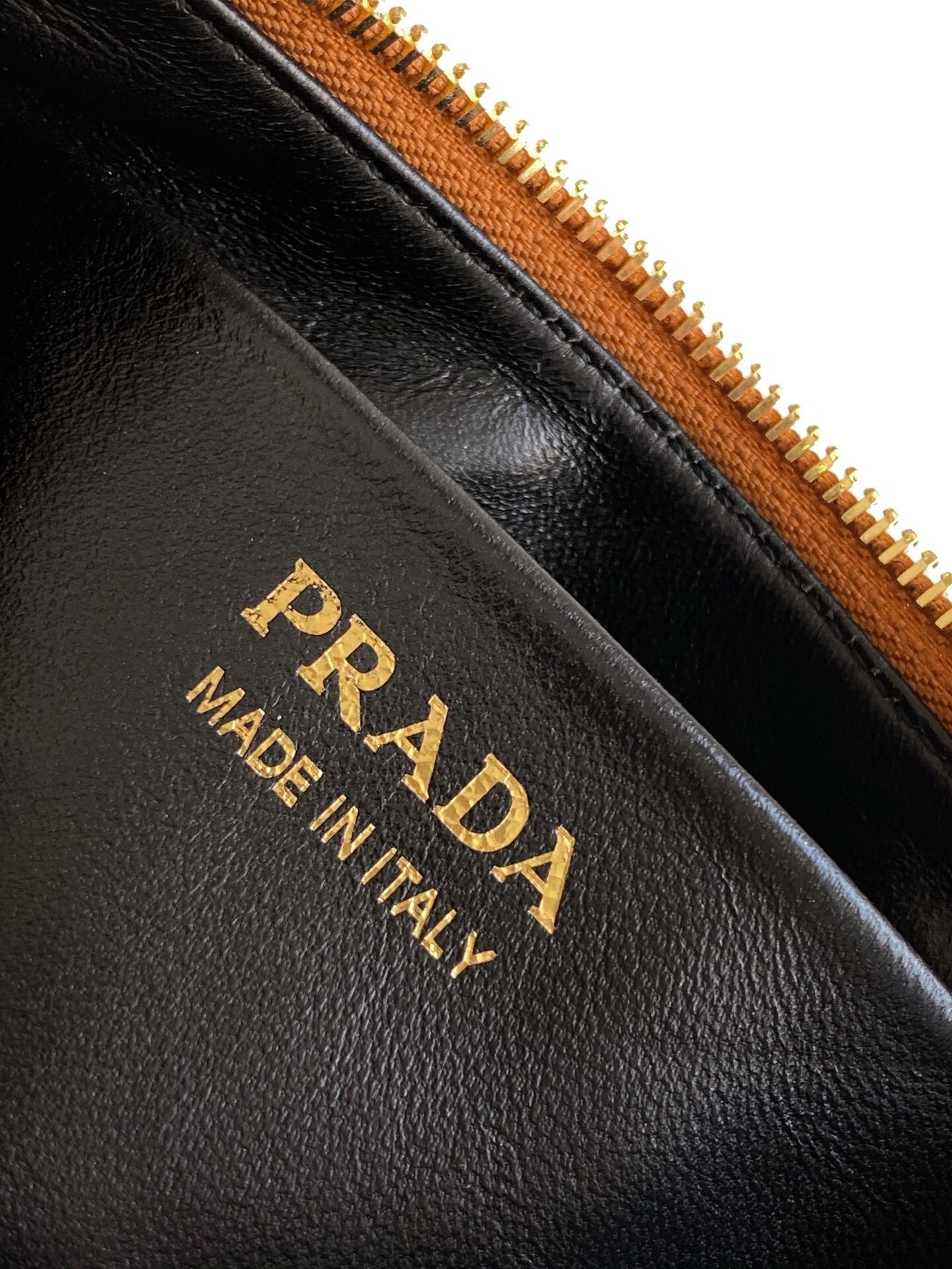 Prada Arqué small leather shoulder bag