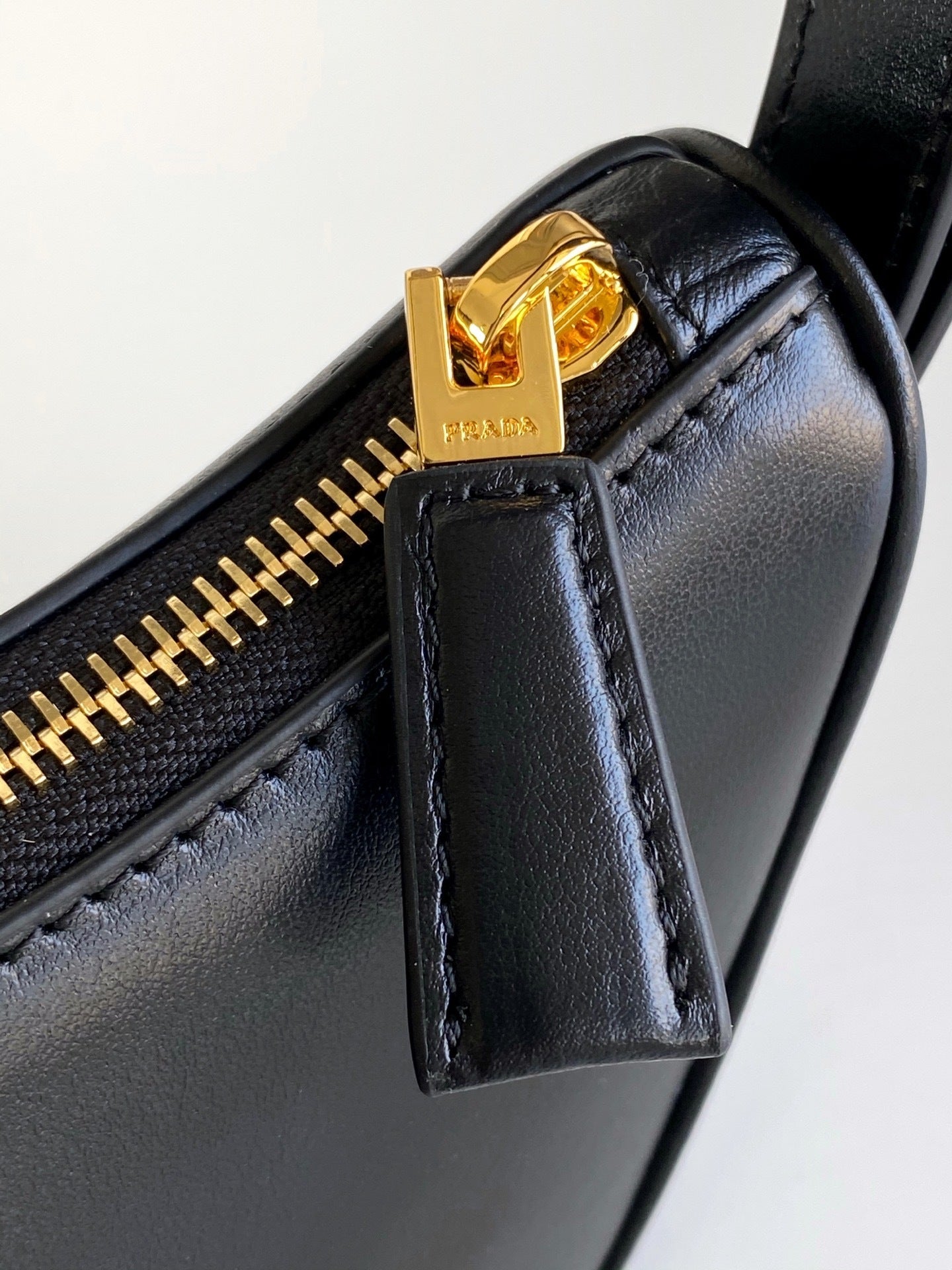 Prada Arqué small leather shoulder bag