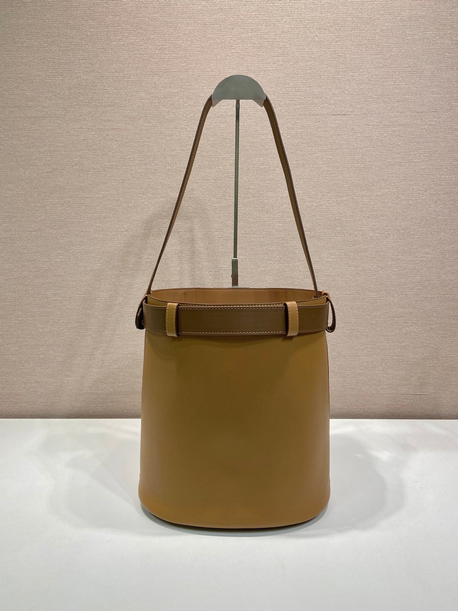 Prada Buckle leather bucket bag with belt