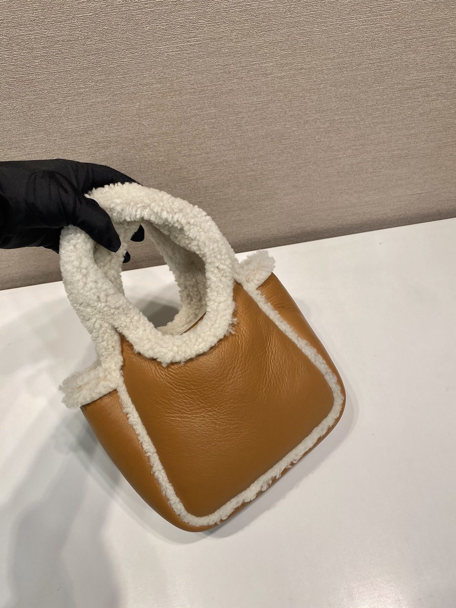 Prada mini shearling handbag
