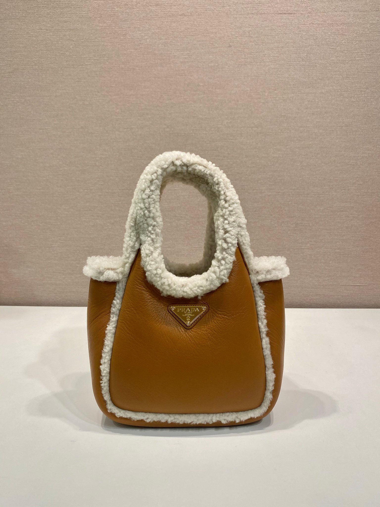 Prada mini shearling handbag