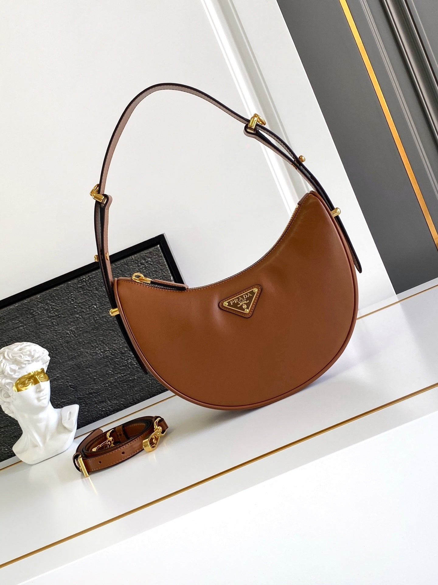 Prada Arqué small leather shoulder bag