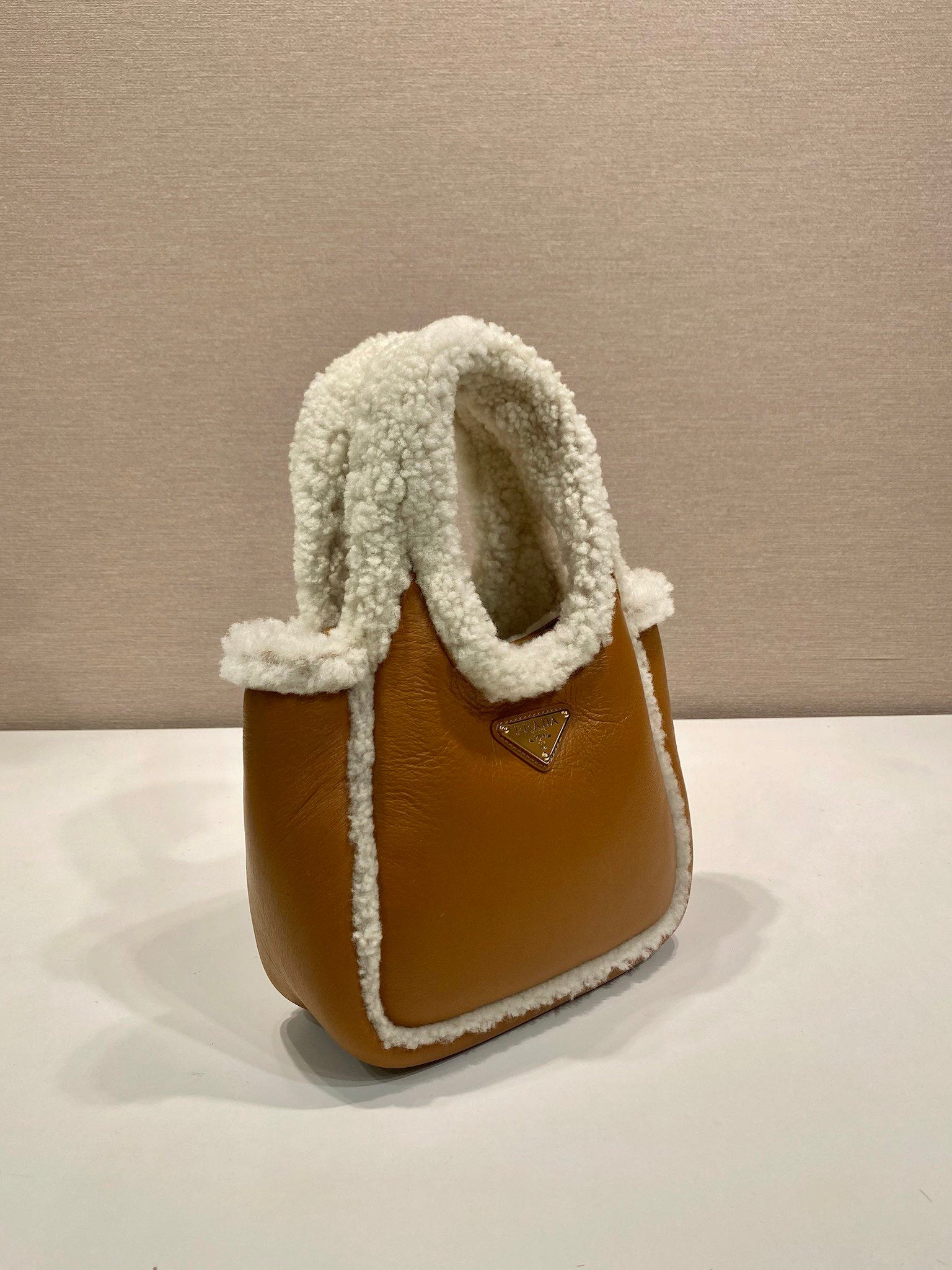Prada mini shearling handbag