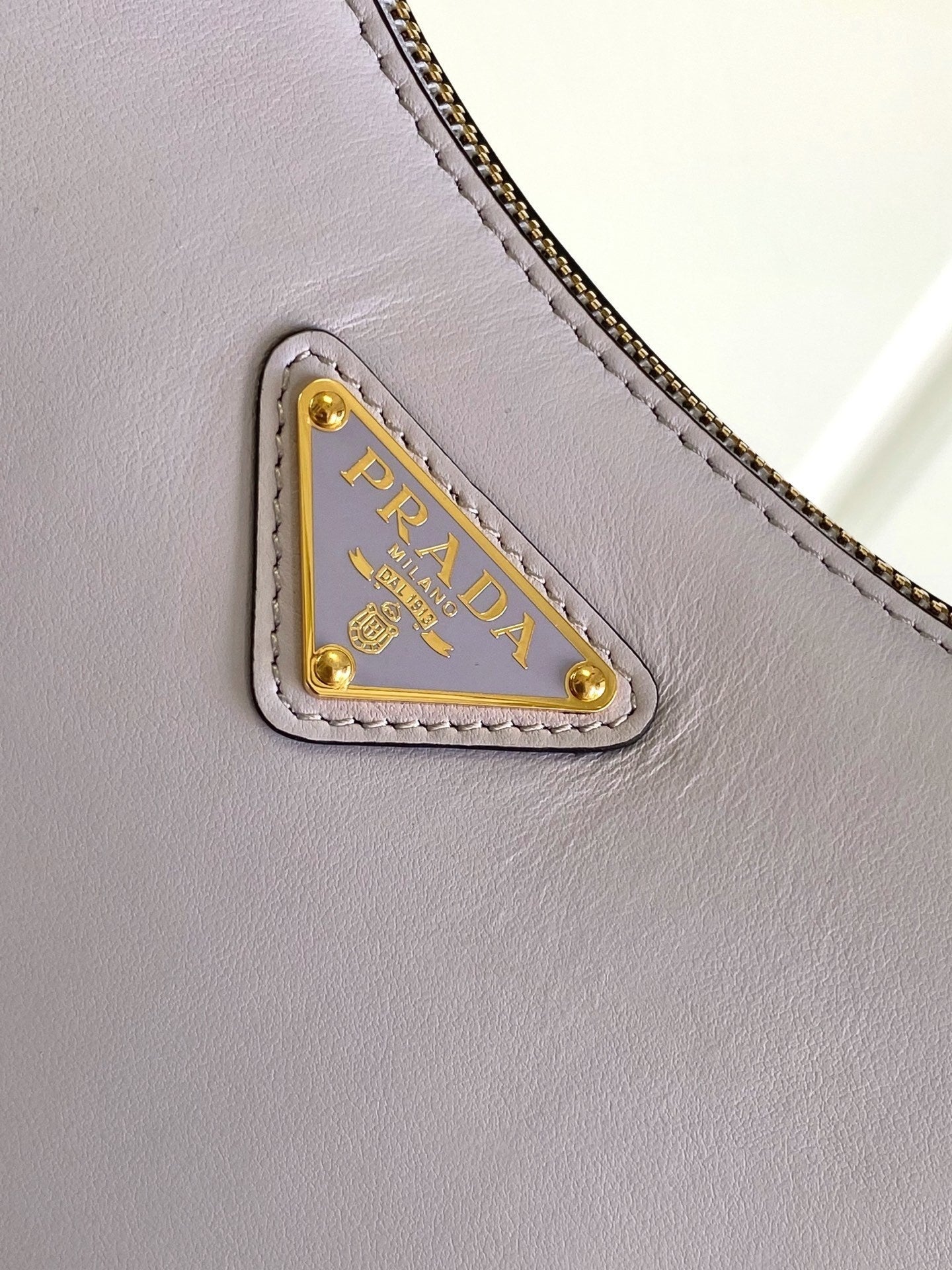 Prada Arqué small leather shoulder bag