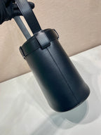 Prada Buckle leather bucket bag with belt