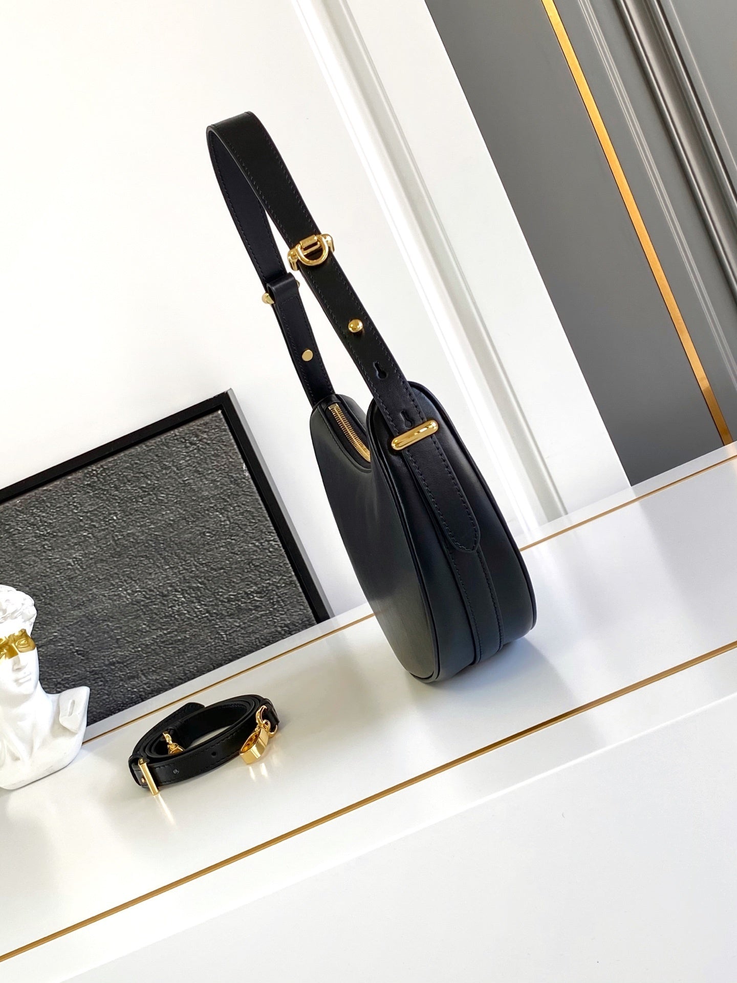 Prada Arqué small leather shoulder bag